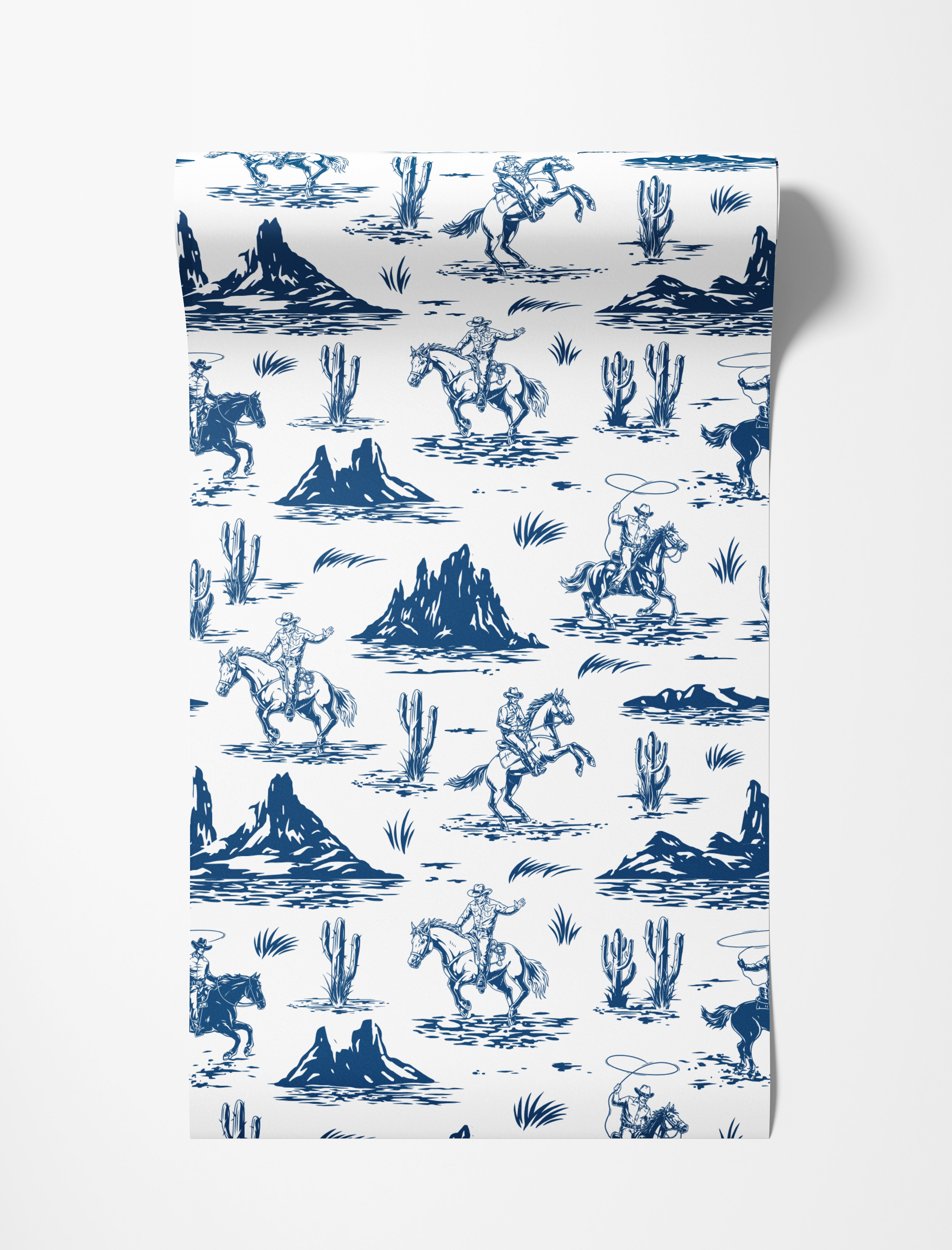 A western toile wallpaper featuring blue illustrations of cowboys, rearing horses, and desert cacti on a white background.