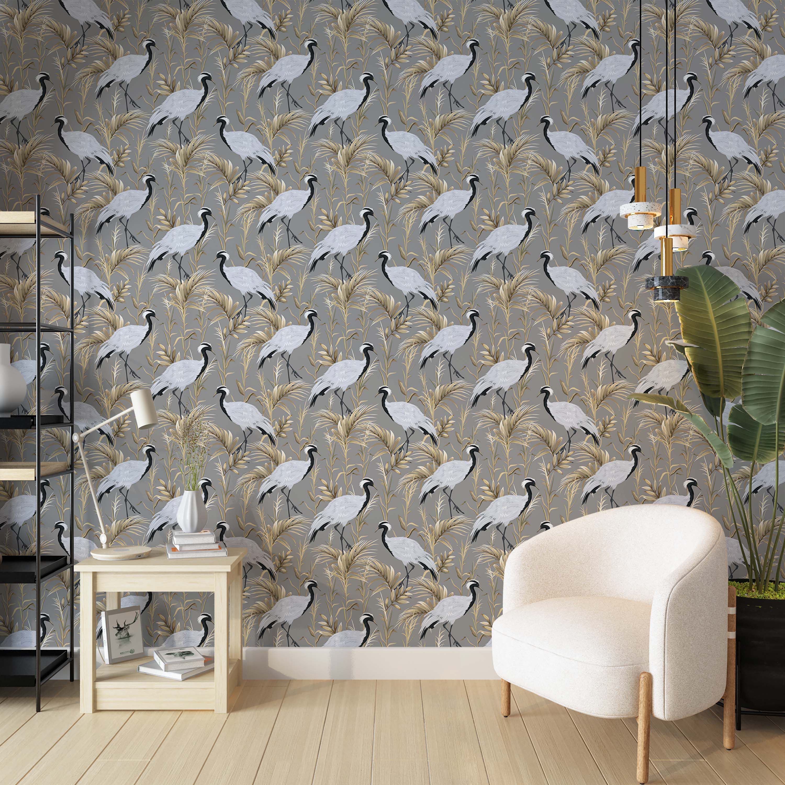 A wallpaper pattern of elegant cranes with black and white feathers standing amidst golden foliage on a gray background.