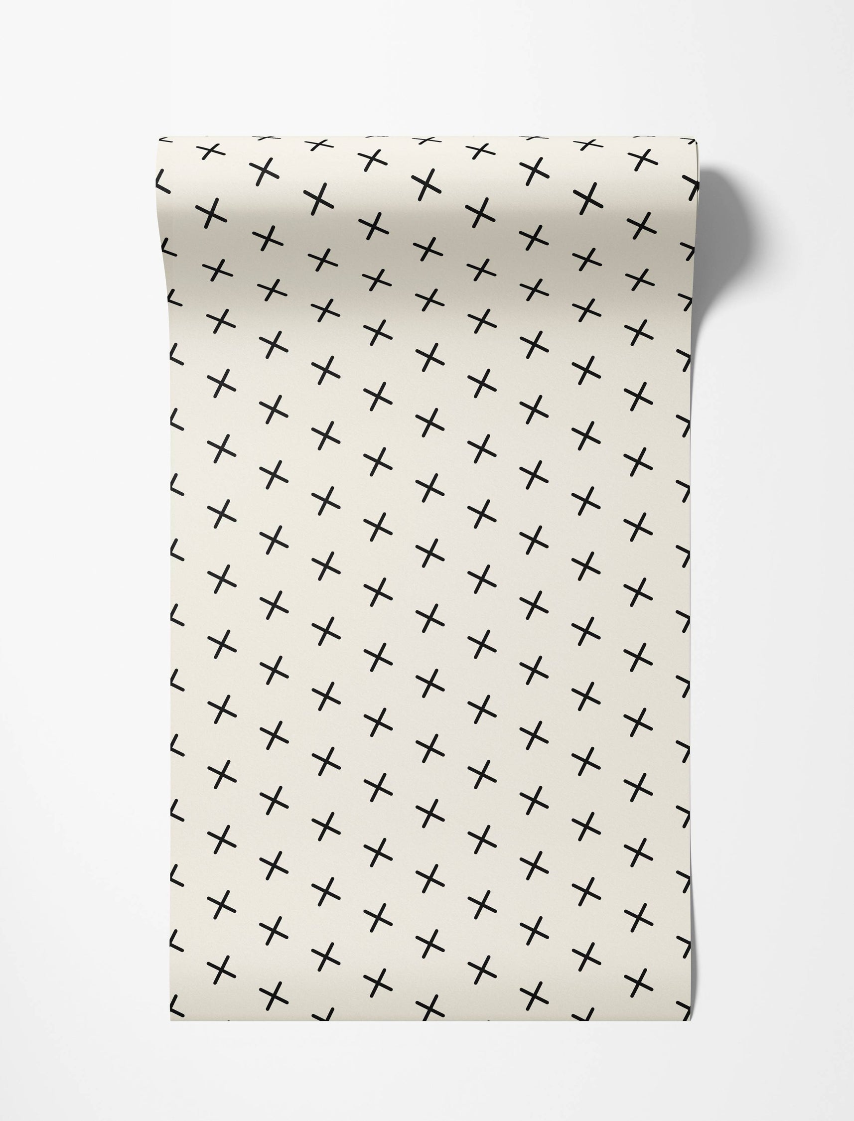 Cream wallpaper with a repeating diagonal grid pattern of simple black plus signs.