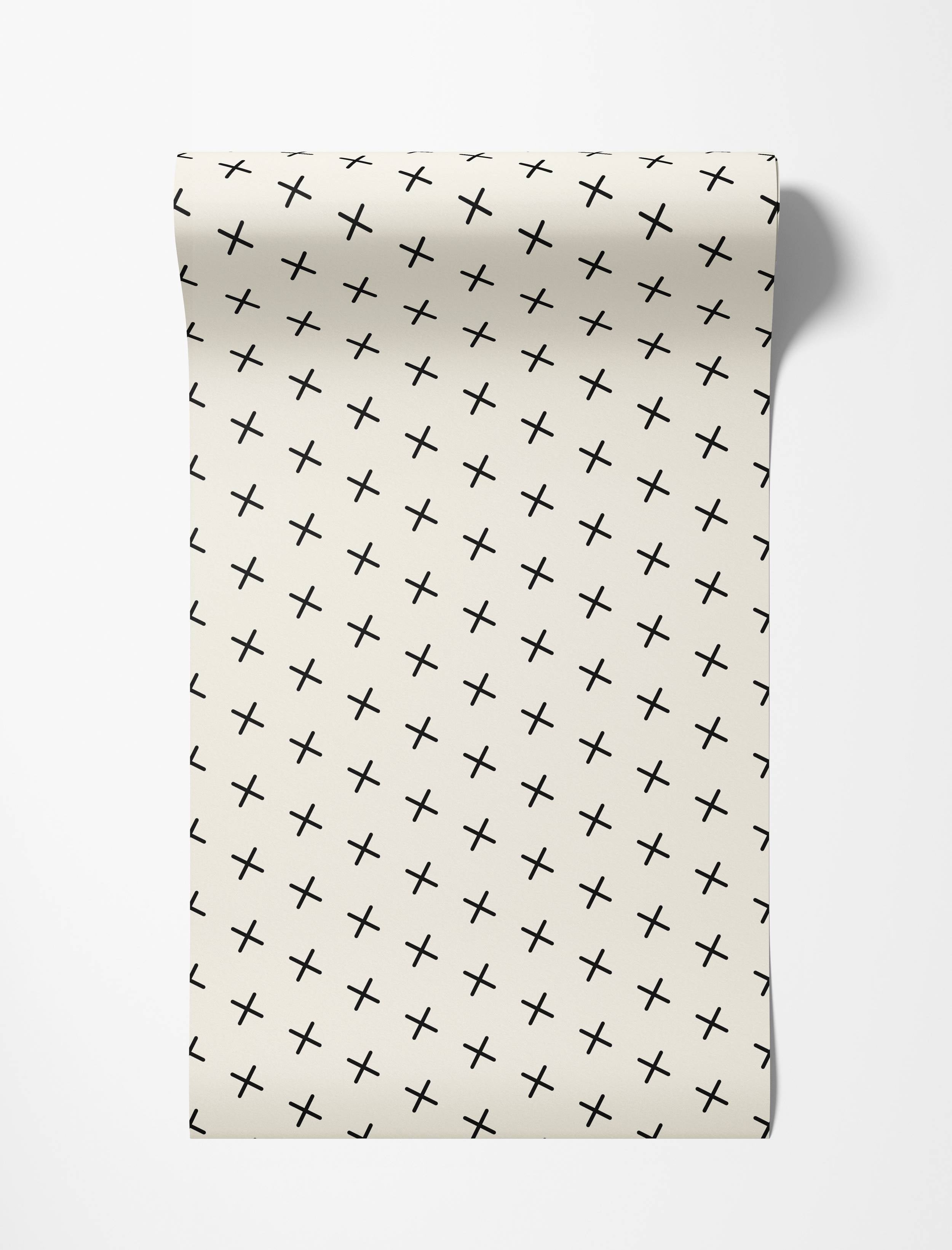 Cream wallpaper with a repeating diagonal grid pattern of simple black plus signs.