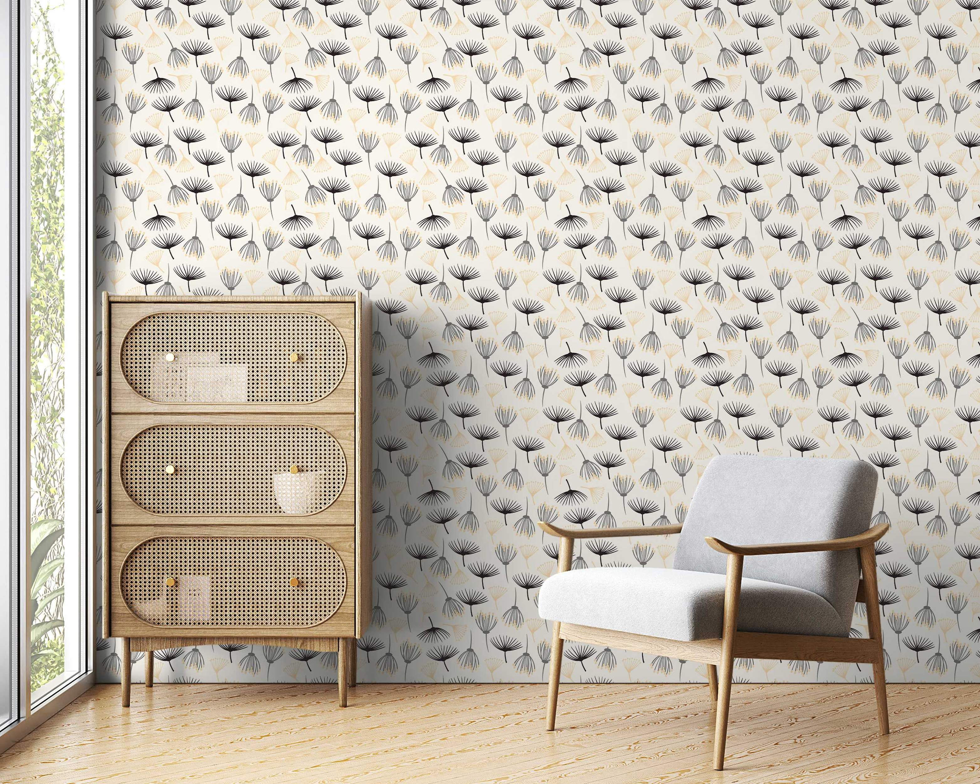 Wallpaper featuring abstract dandelion seed motifs in black, gray, and pale yellow scattered across an off-white background.