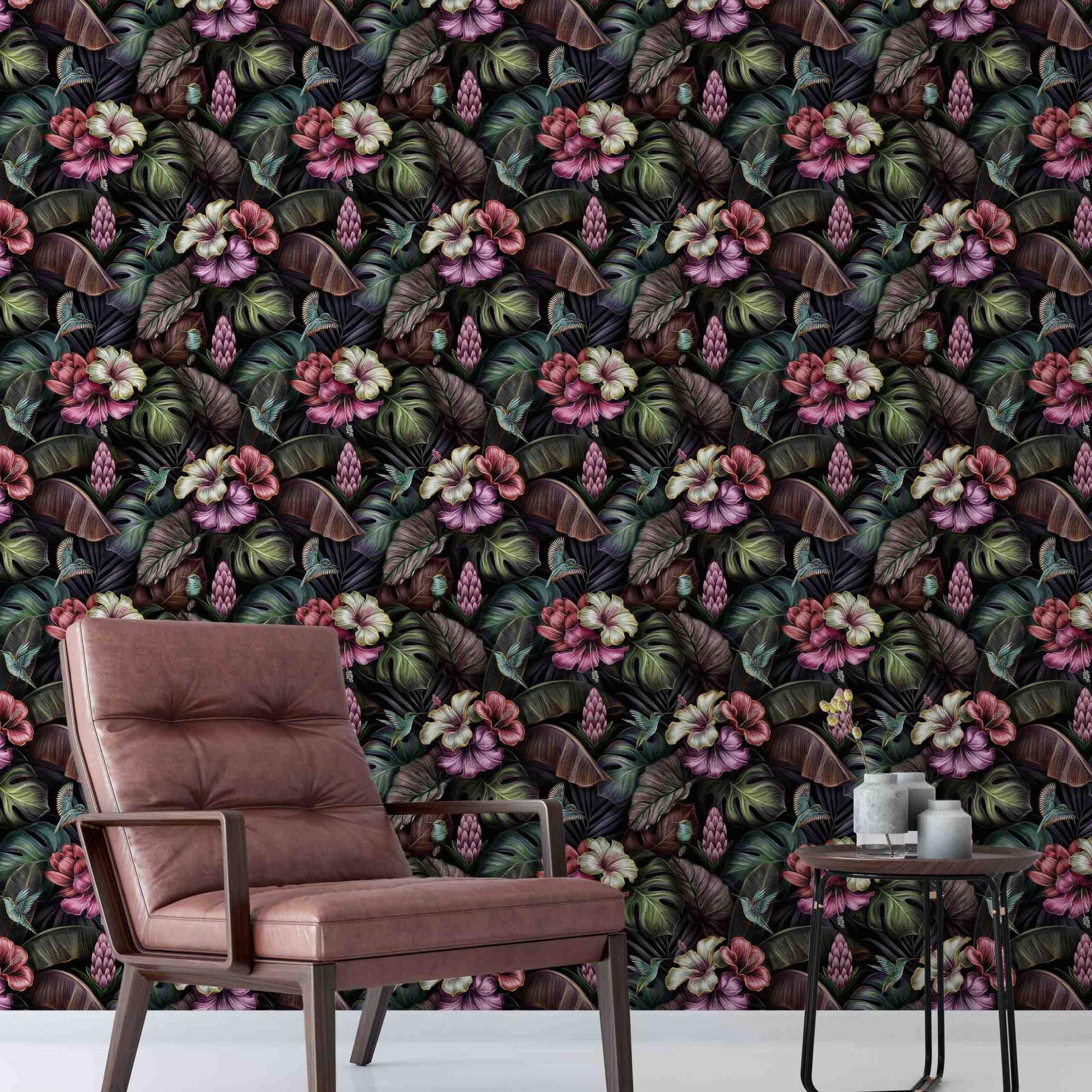 Wallpaper featuring a dark tropical botanical pattern with lush leaves, vibrant hibiscus flowers, exotic buds, and hummingbirds.