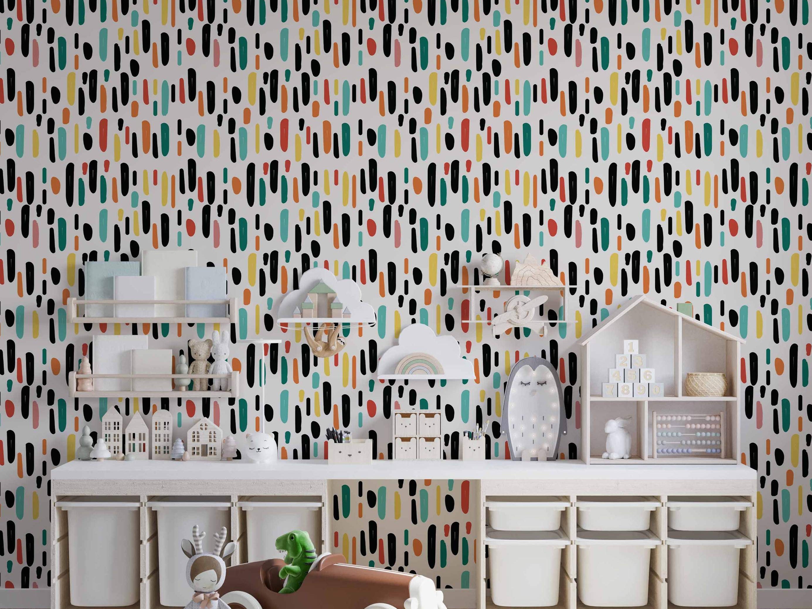 Wallpaper featuring a playful pattern of vertical, hand-drawn dashes in black, teal, yellow, orange, and pink on a light background.