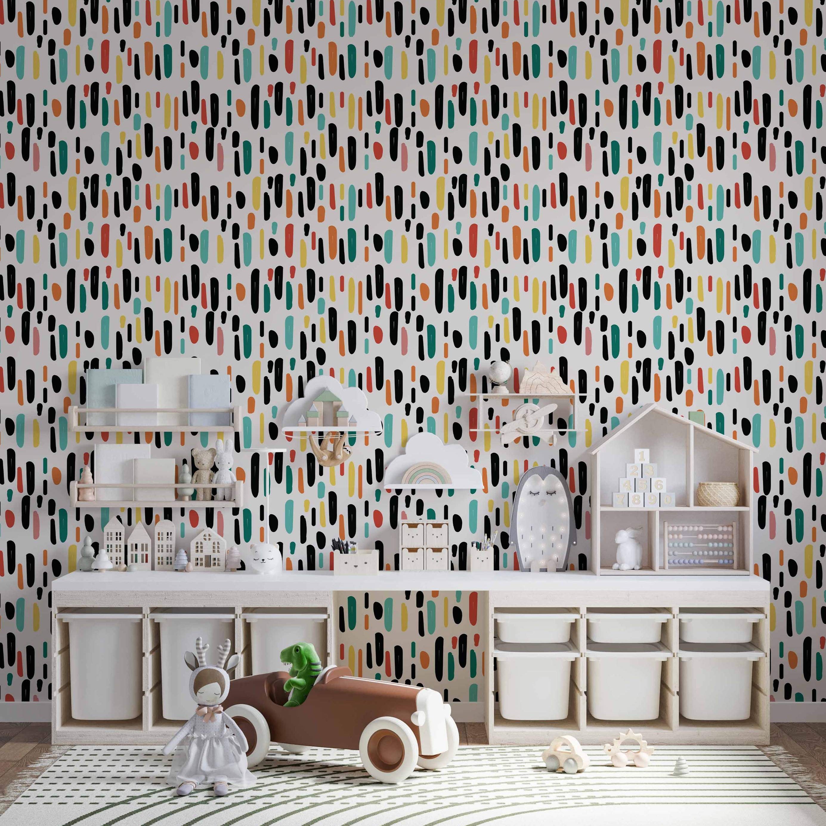 Wallpaper featuring a playful pattern of vertical, hand-drawn dashes in black, teal, yellow, orange, and pink on a light background.