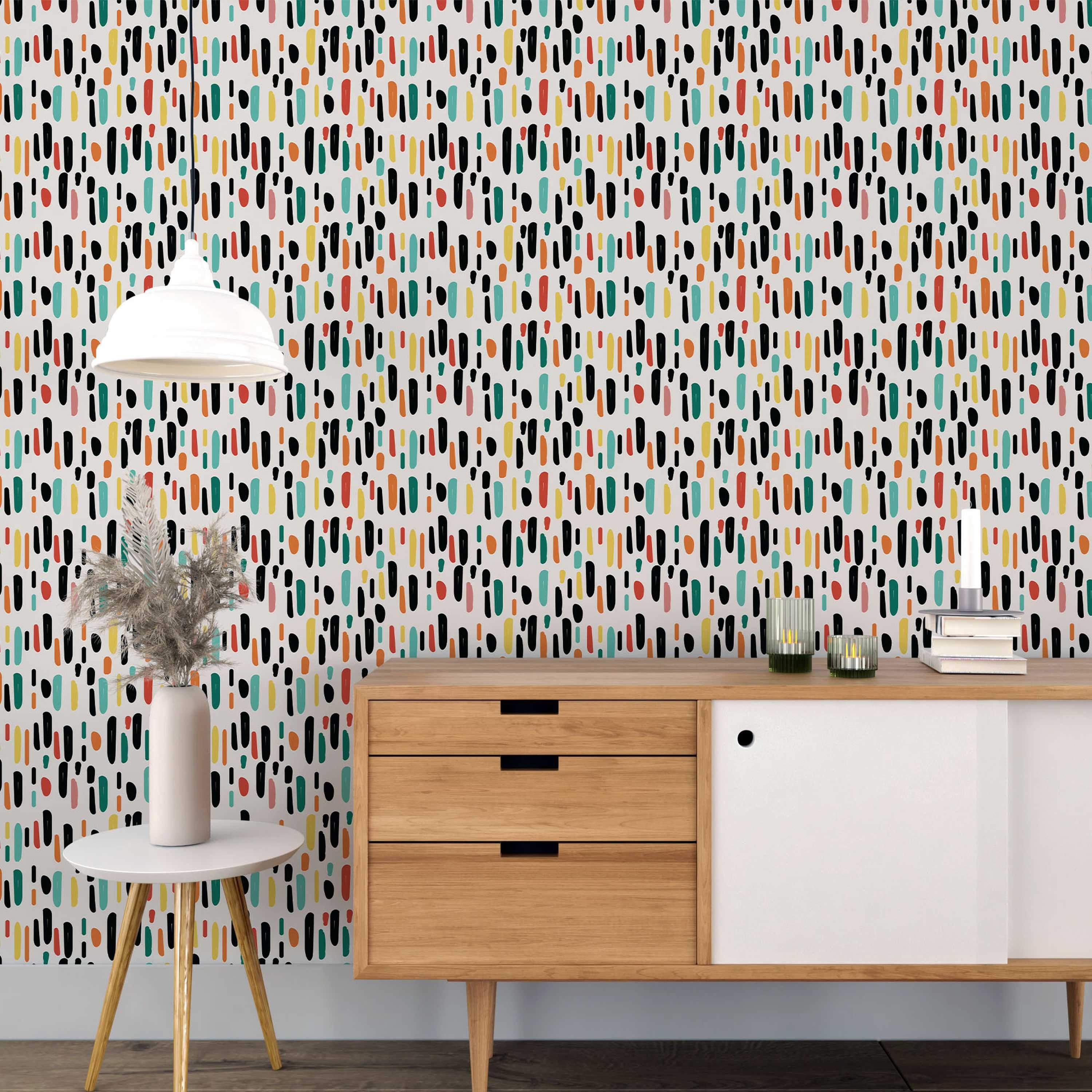 Abstract wallpaper featuring vertical, hand-painted style dashes in black, teal, yellow, red, orange, and pink on a white background.