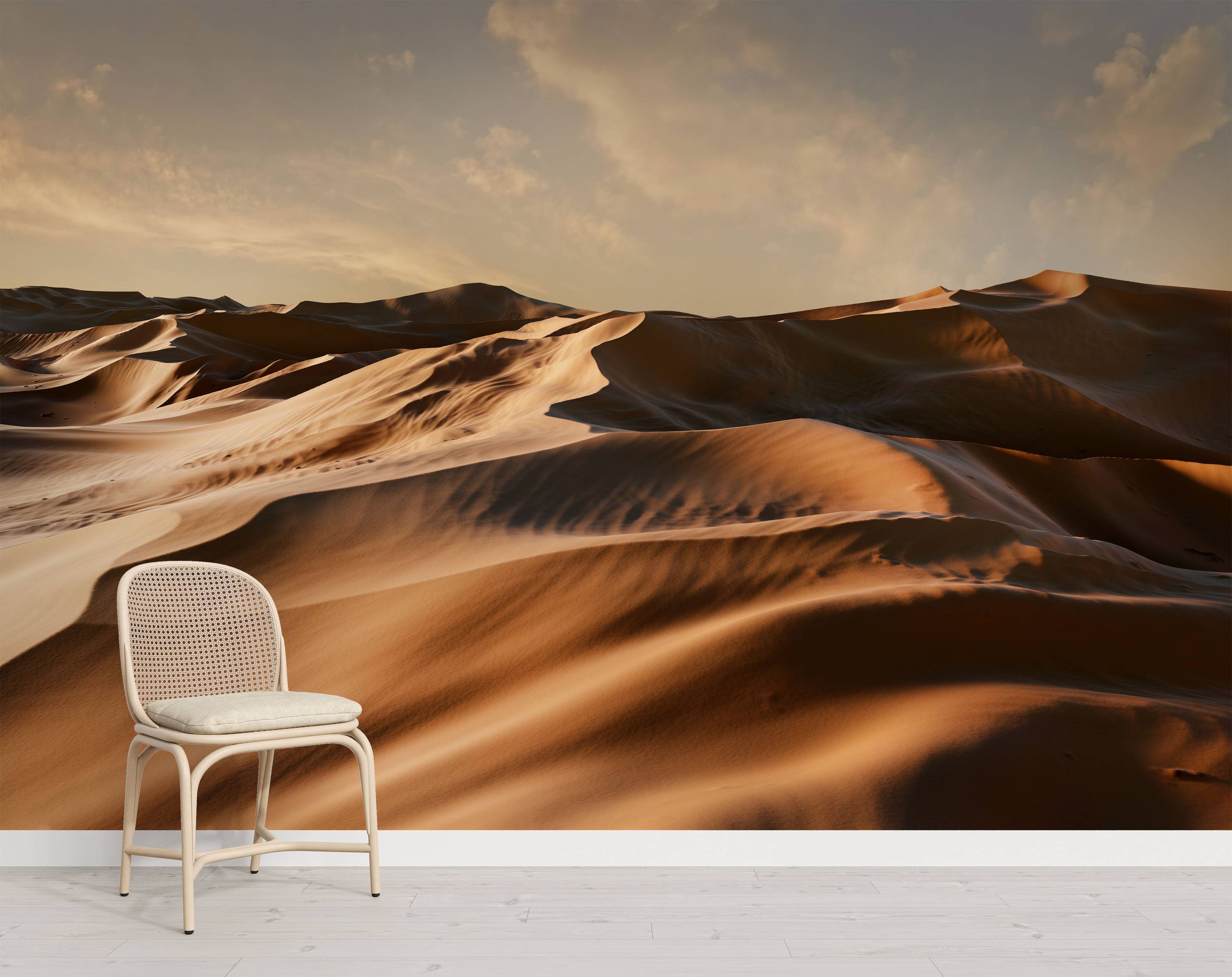 A scenic mural of vast desert sand dunes bathed in warm, golden sunset light. The rolling hills cast soft shadows.