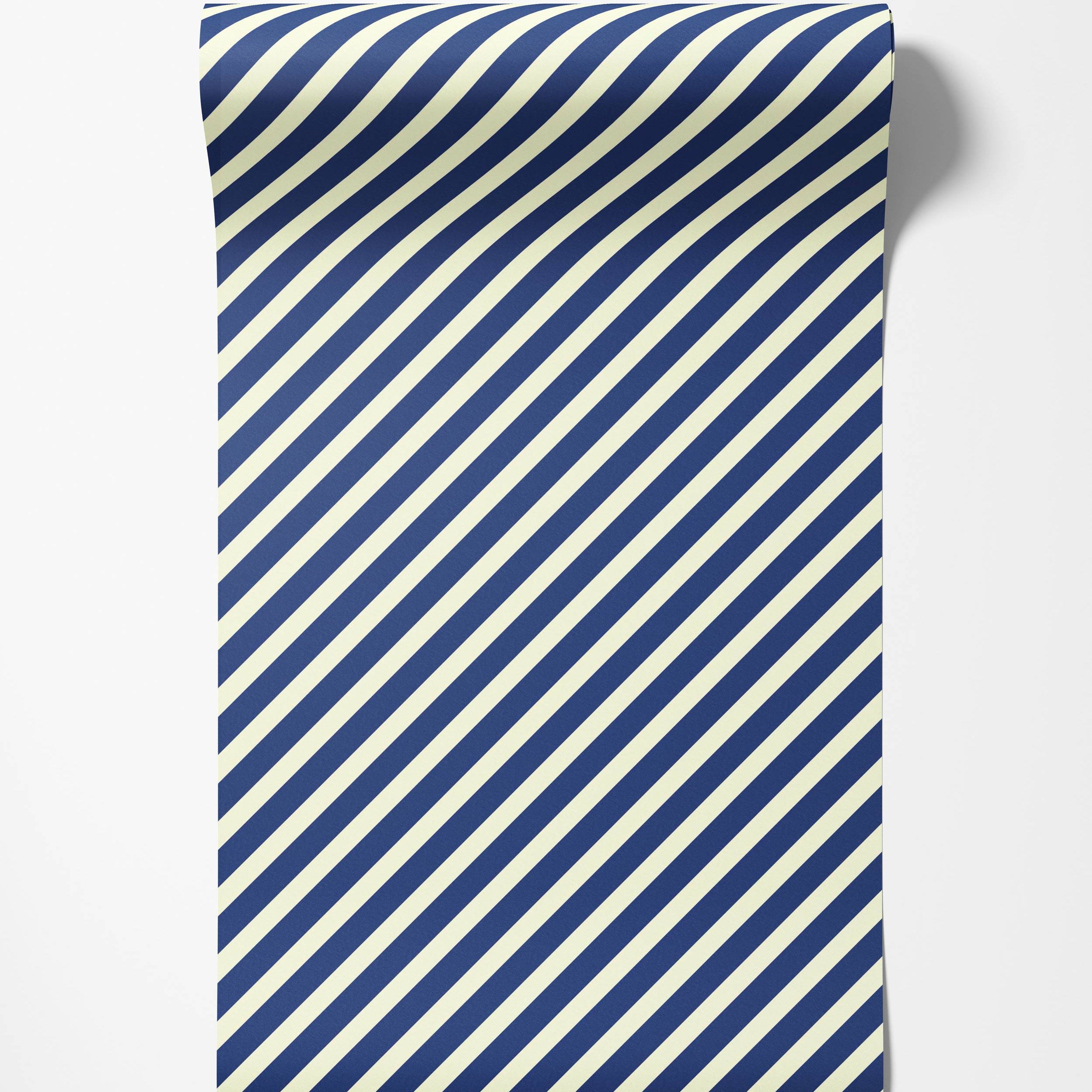 A classic wallpaper design featuring evenly spaced diagonal stripes in a deep navy blue and off-white color scheme.