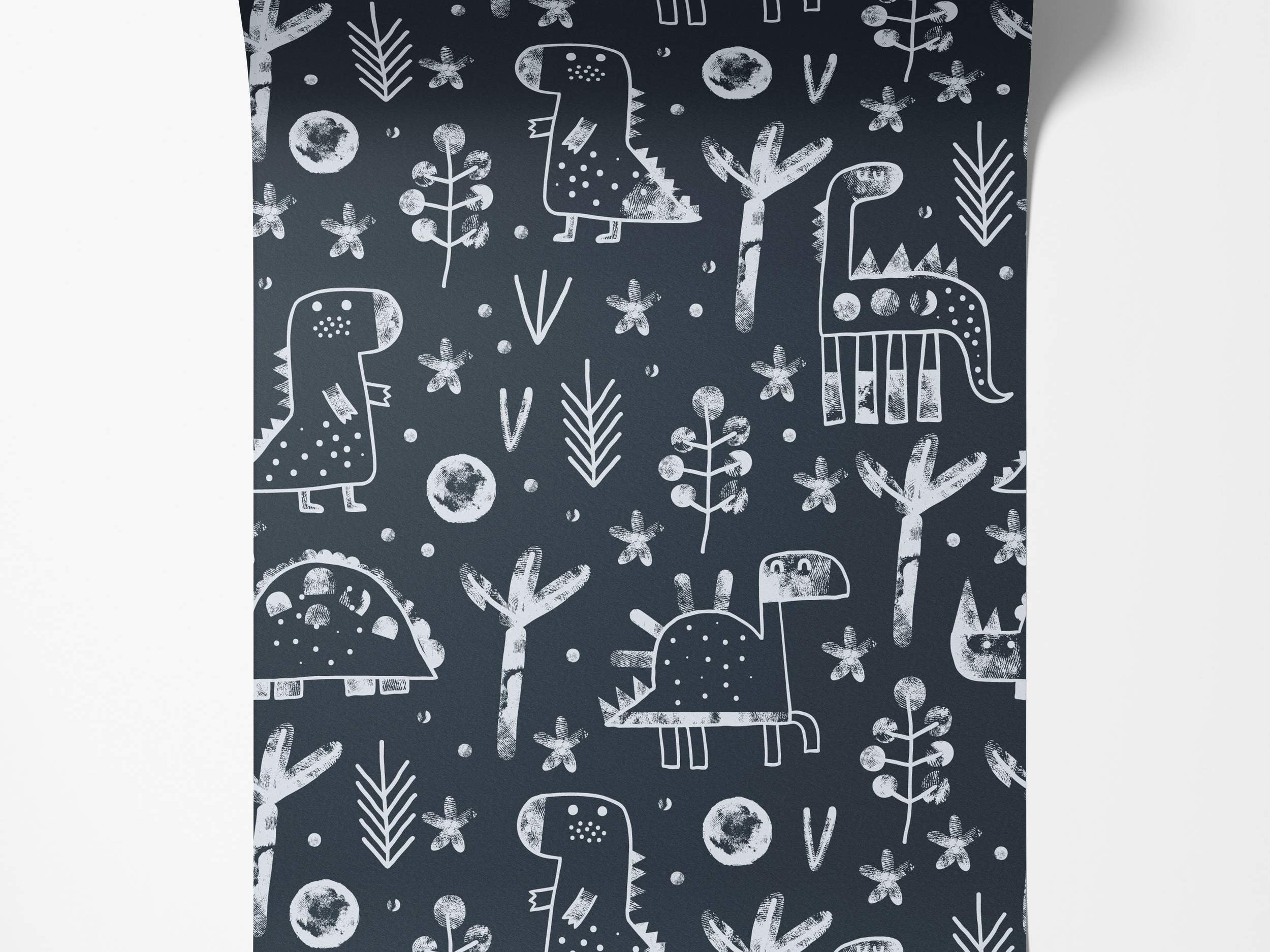 Dark blue wallpaper with a white block-print pattern of stylized dinosaurs, trees, and flowers.