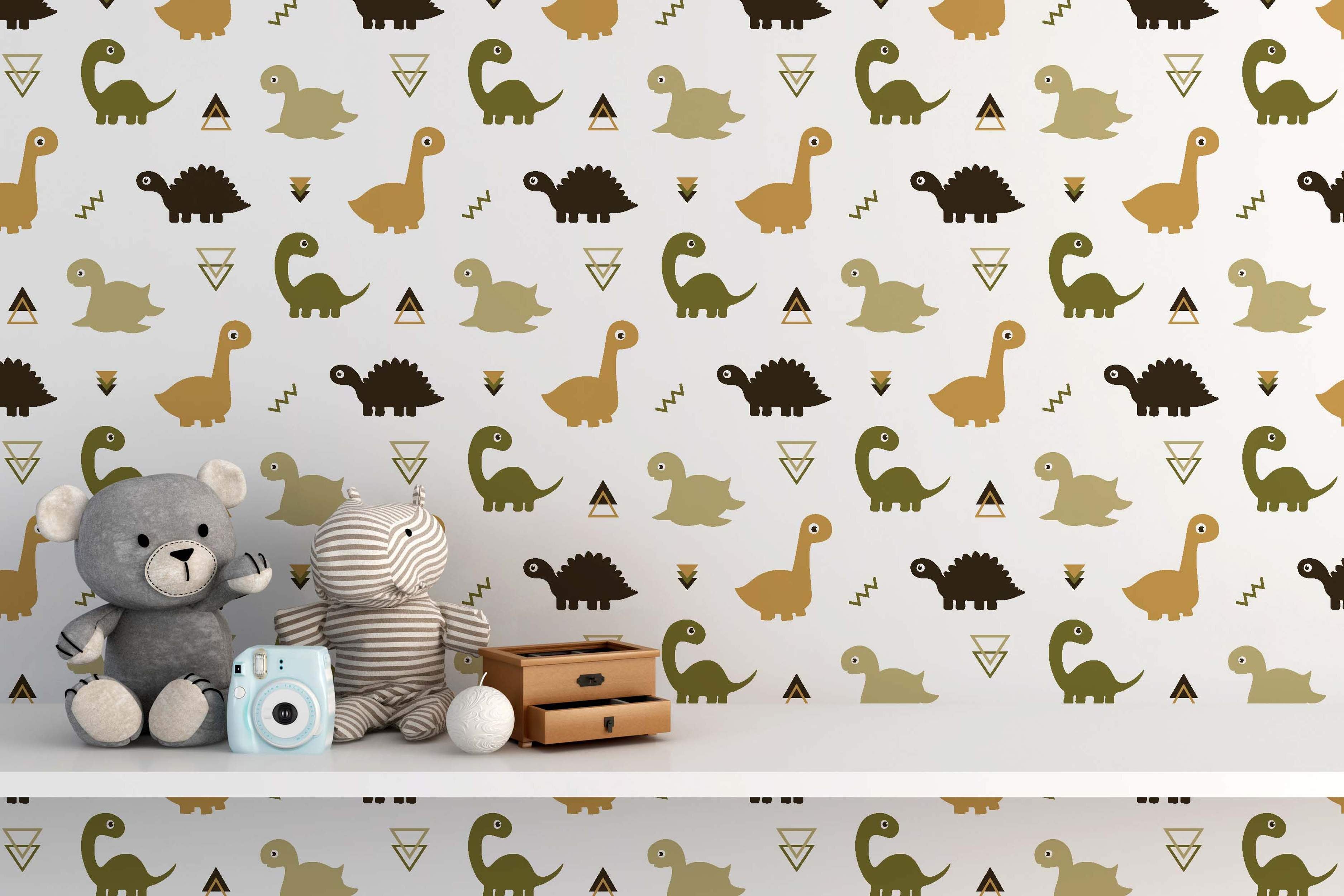 Repeating wallpaper pattern of simplified dinosaurs and geometric shapes in earthy brown, green, and beige tones.