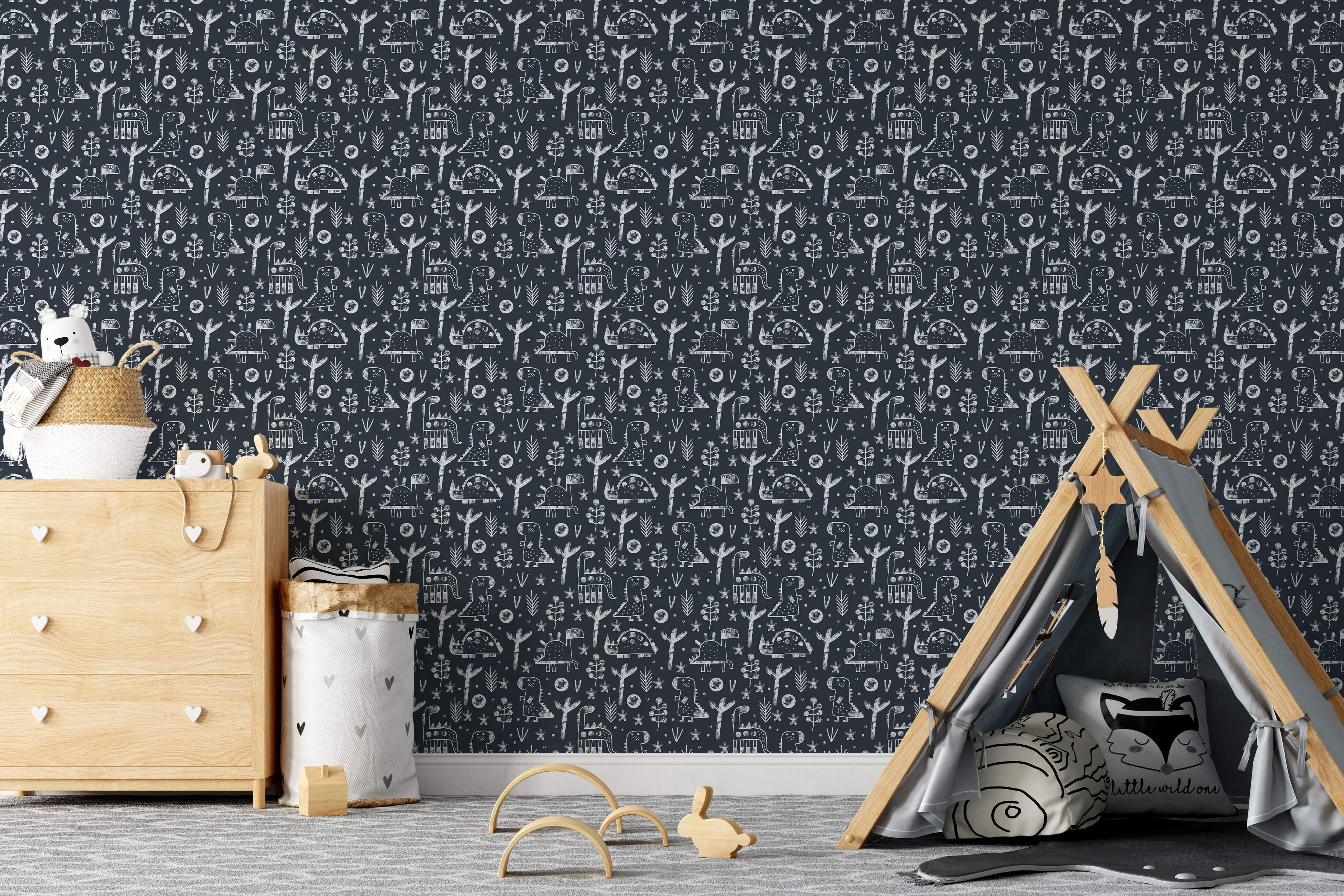 Kids' wallpaper with a playful, sketchy pattern of white dinosaurs and plants on a dark charcoal blue background.