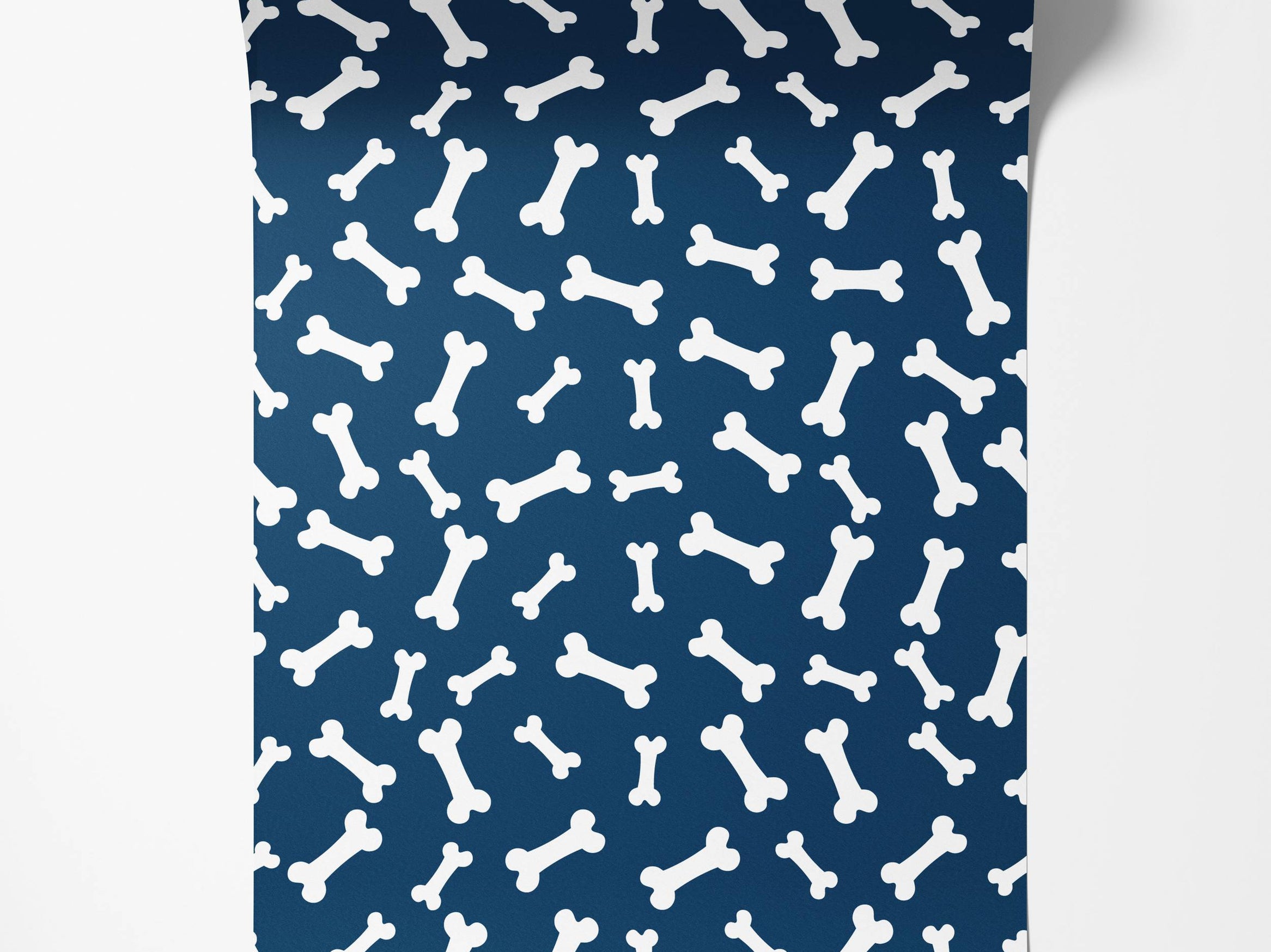 A playful wallpaper featuring a scattered pattern of white cartoon dog bones on a dark blue background.