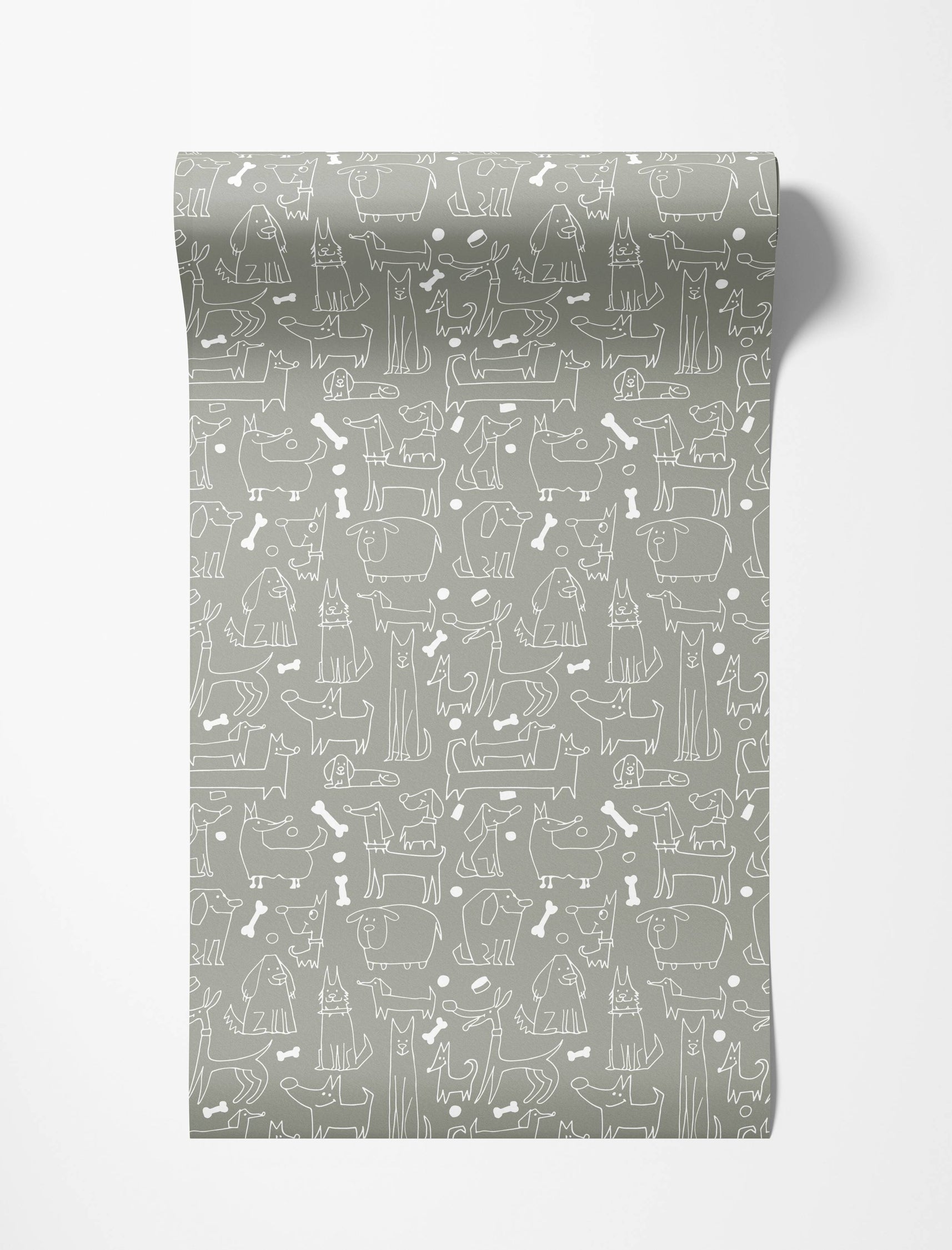 A playful wallpaper featuring white, hand-drawn cartoon dogs of various breeds and bones on a muted gray background.