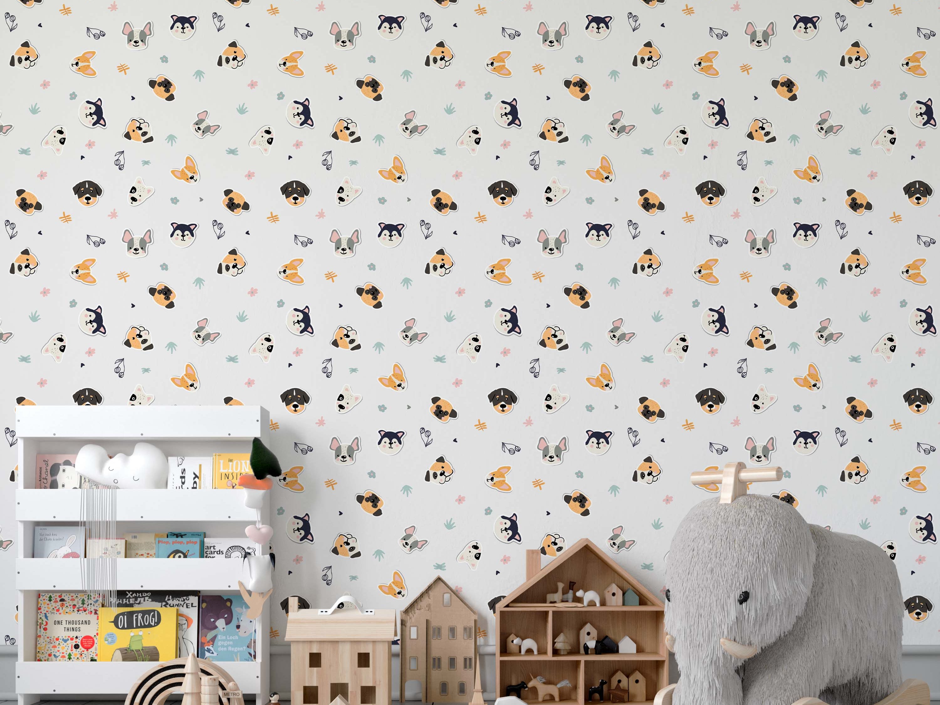 A playful wallpaper with a pattern of assorted cartoon dog faces in orange, black, and gray on a white background.