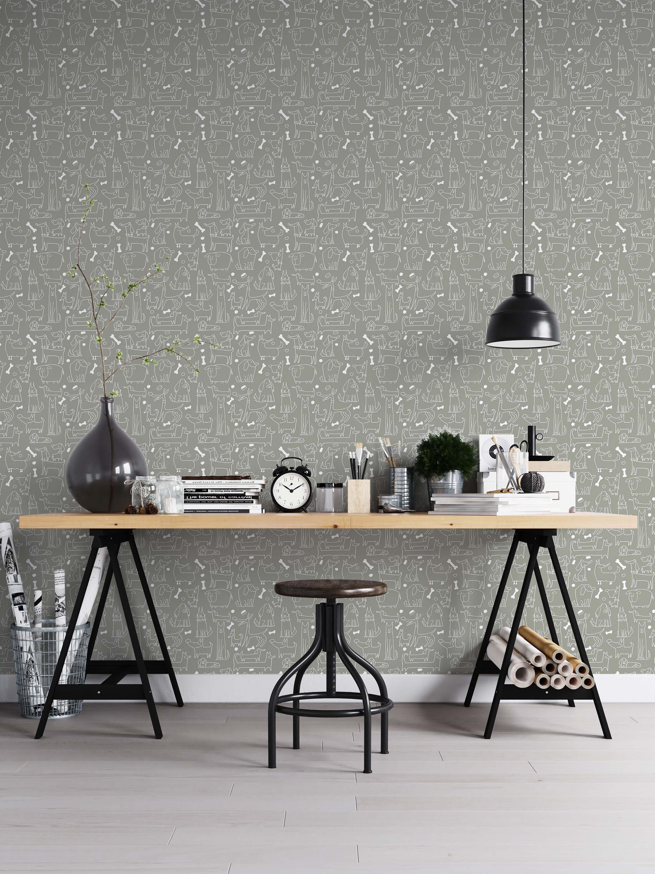 Whimsical wallpaper featuring a pattern of white, hand-drawn cartoon dogs and bones on a solid gray background.