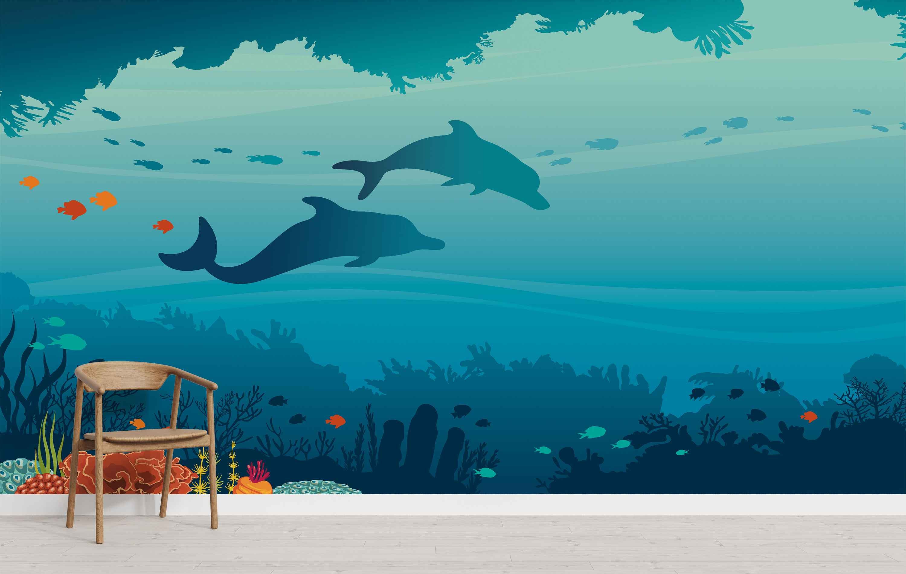 Underwater scene mural featuring blue dolphin and fish silhouettes swimming amid coral against a gradient blue-teal background.
