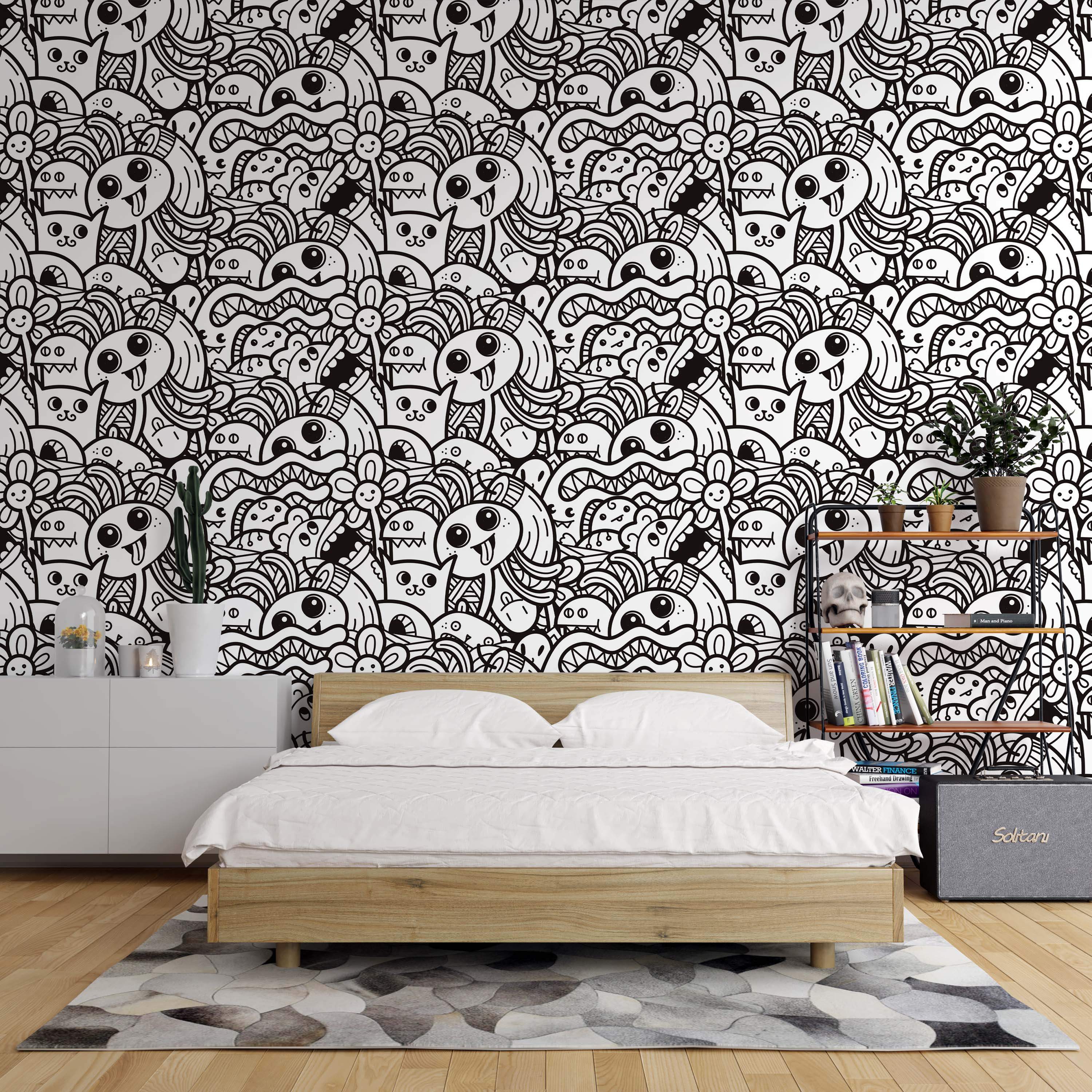 Black and white wallpaper featuring a dense doodle pattern of whimsical cartoon monsters, cats, and flowers.