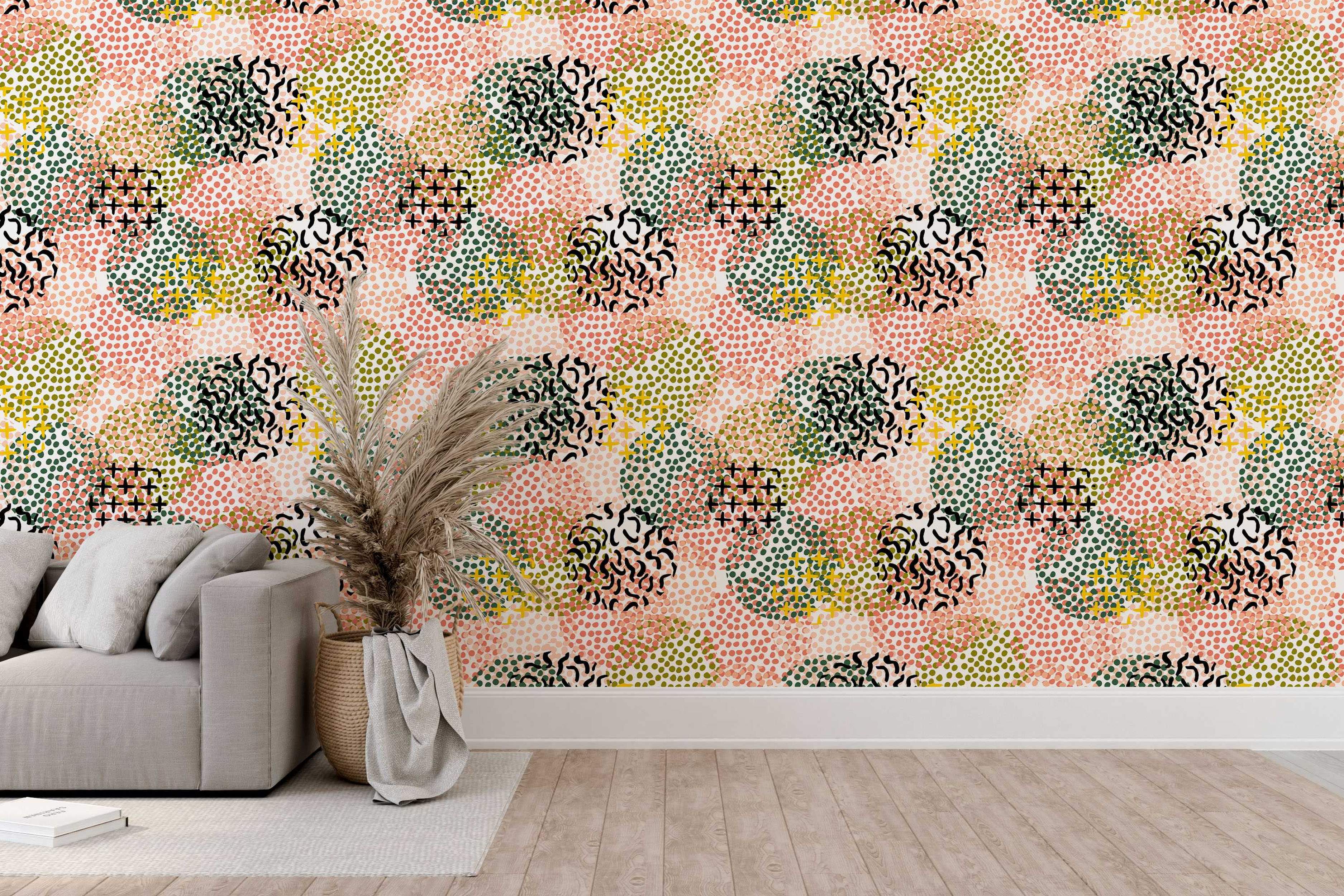 Abstract wallpaper with overlapping clusters of pink, olive, dark green, and yellow dots, plus black squiggles and crosses on white.