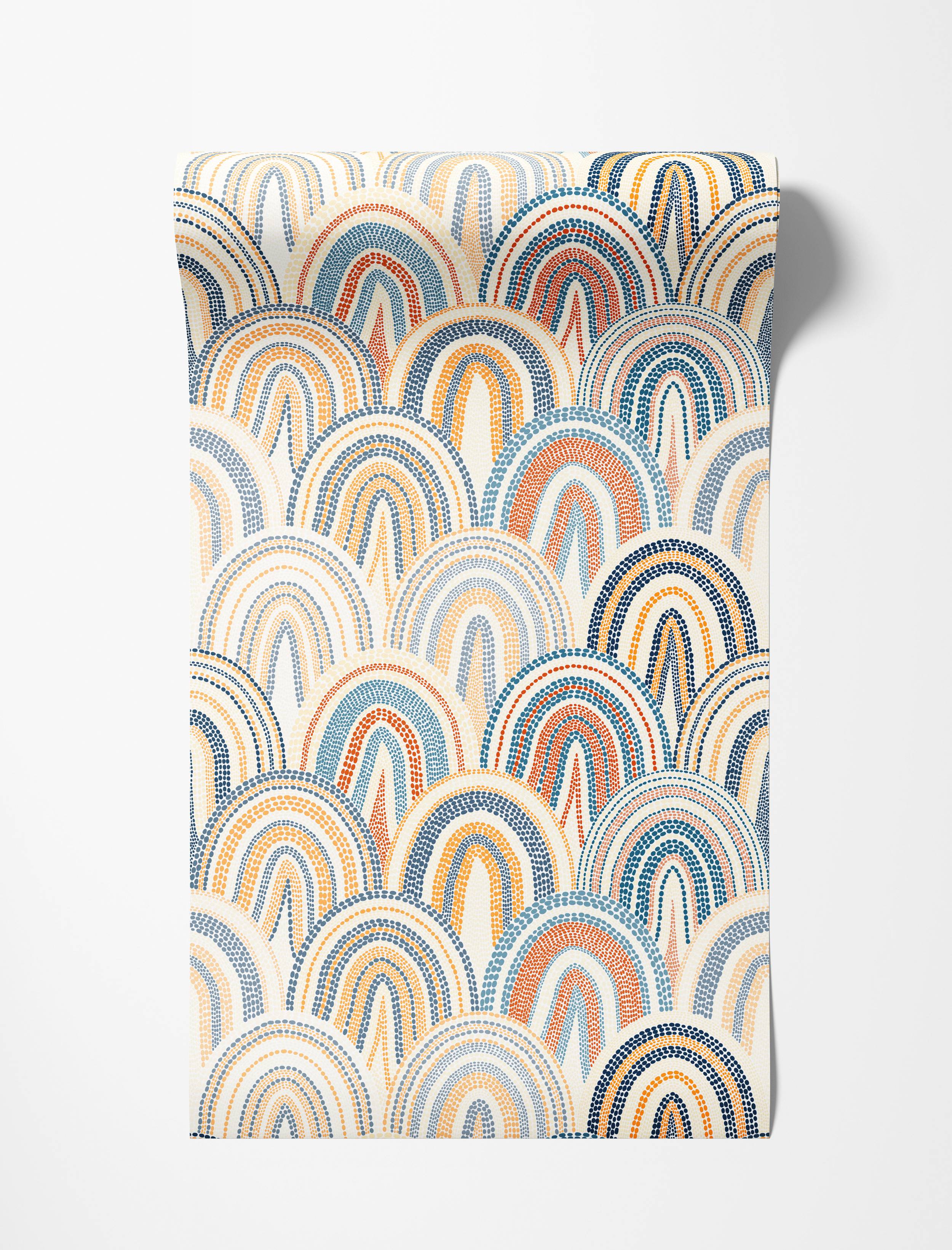 Wallpaper with a pattern of overlapping, dotted arches in shades of blue, orange, and yellow on a cream background.