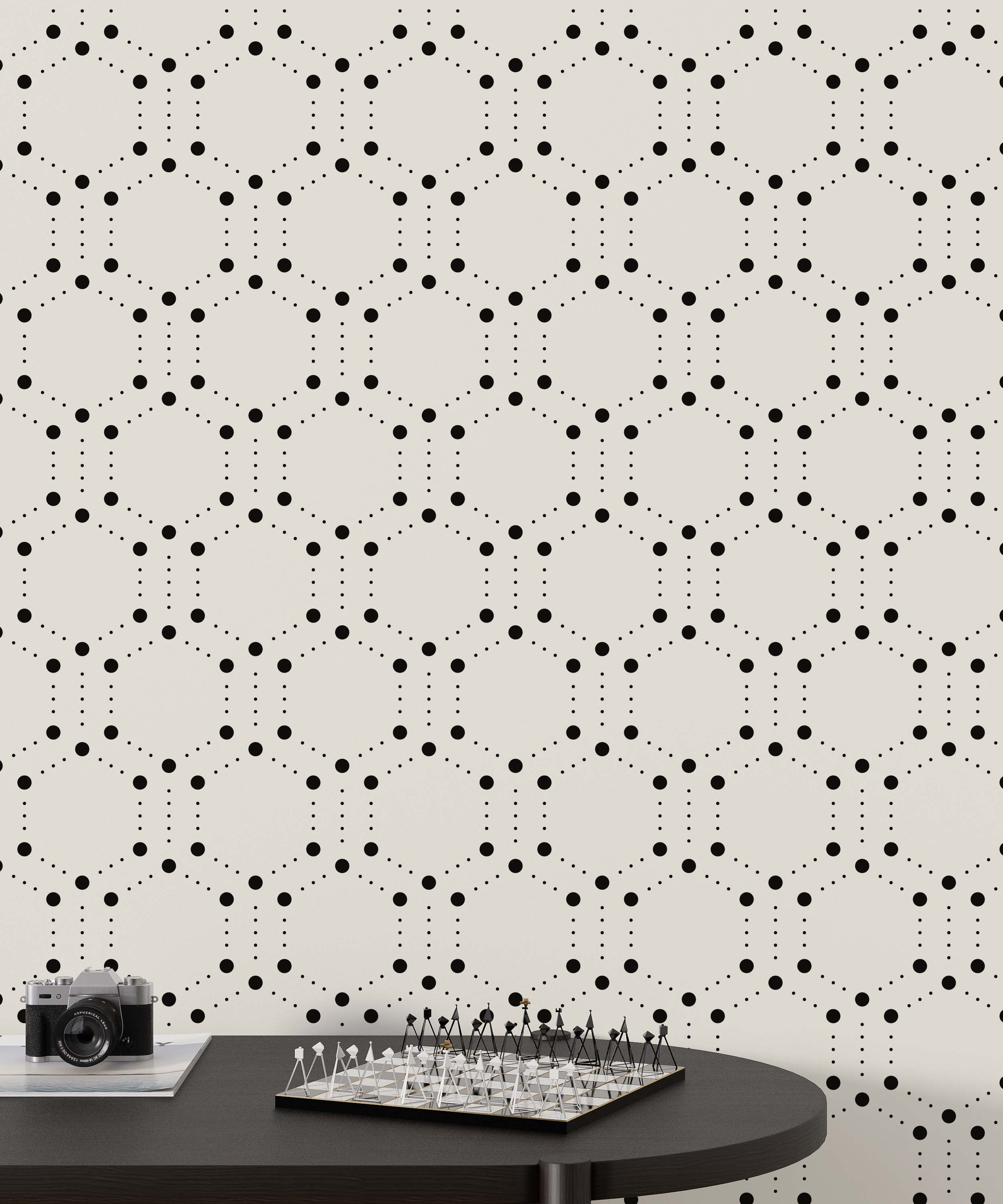 Wallpaper featuring a geometric pattern of large black dots forming hexagons, connected by smaller dotted lines, on a beige background.