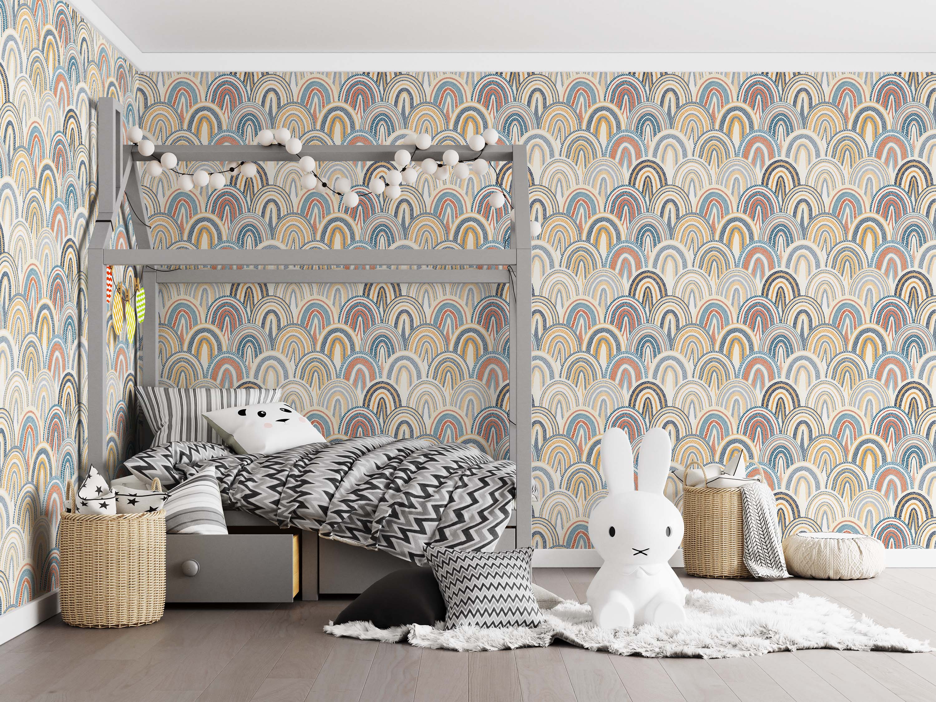 Wallpaper with a repeating pattern of dotted rainbows in muted blue, orange, yellow, and black on a cream background.