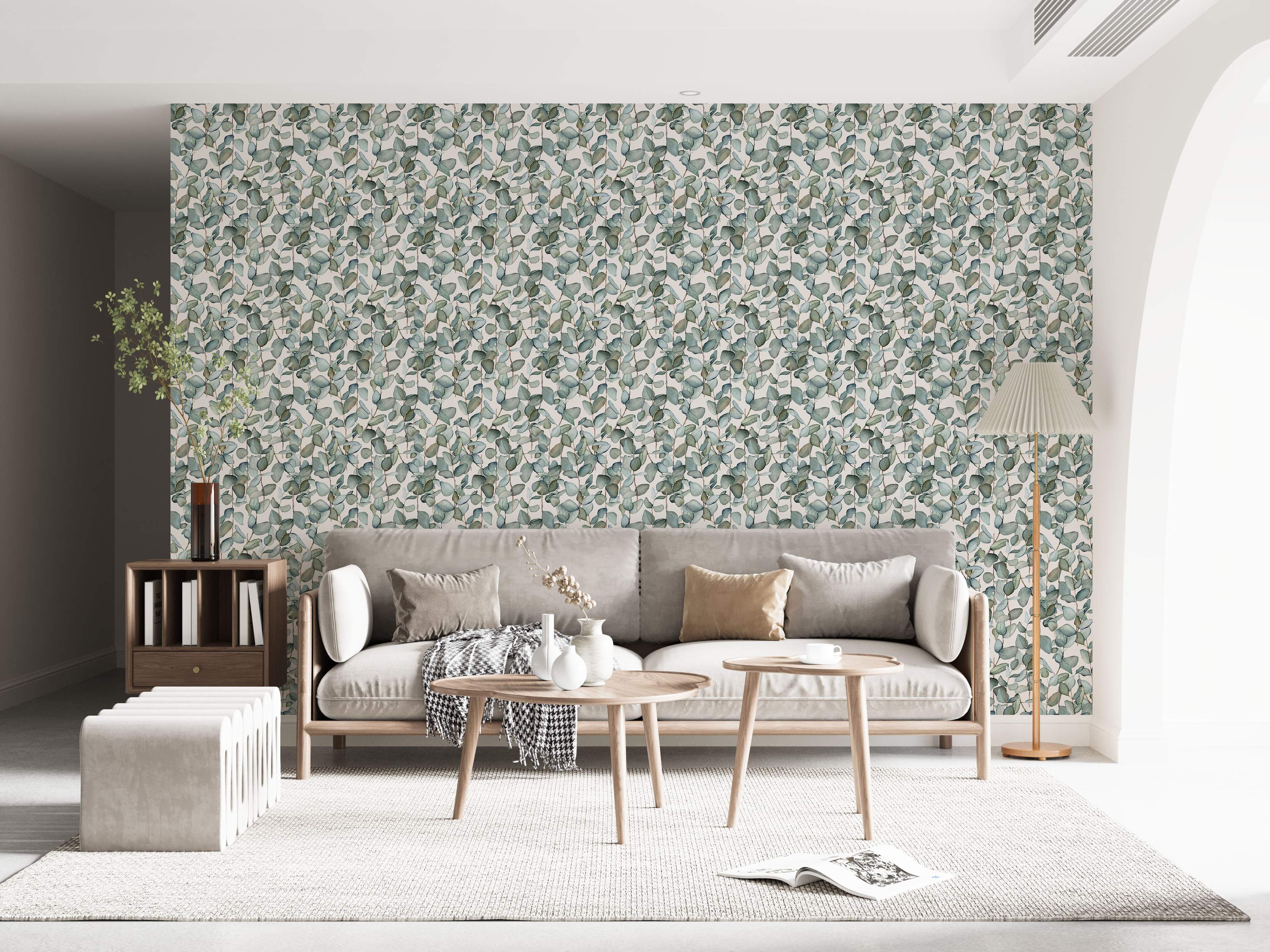 Wallpaper featuring a repeating watercolor pattern of green eucalyptus stems and leaves on a light beige background.