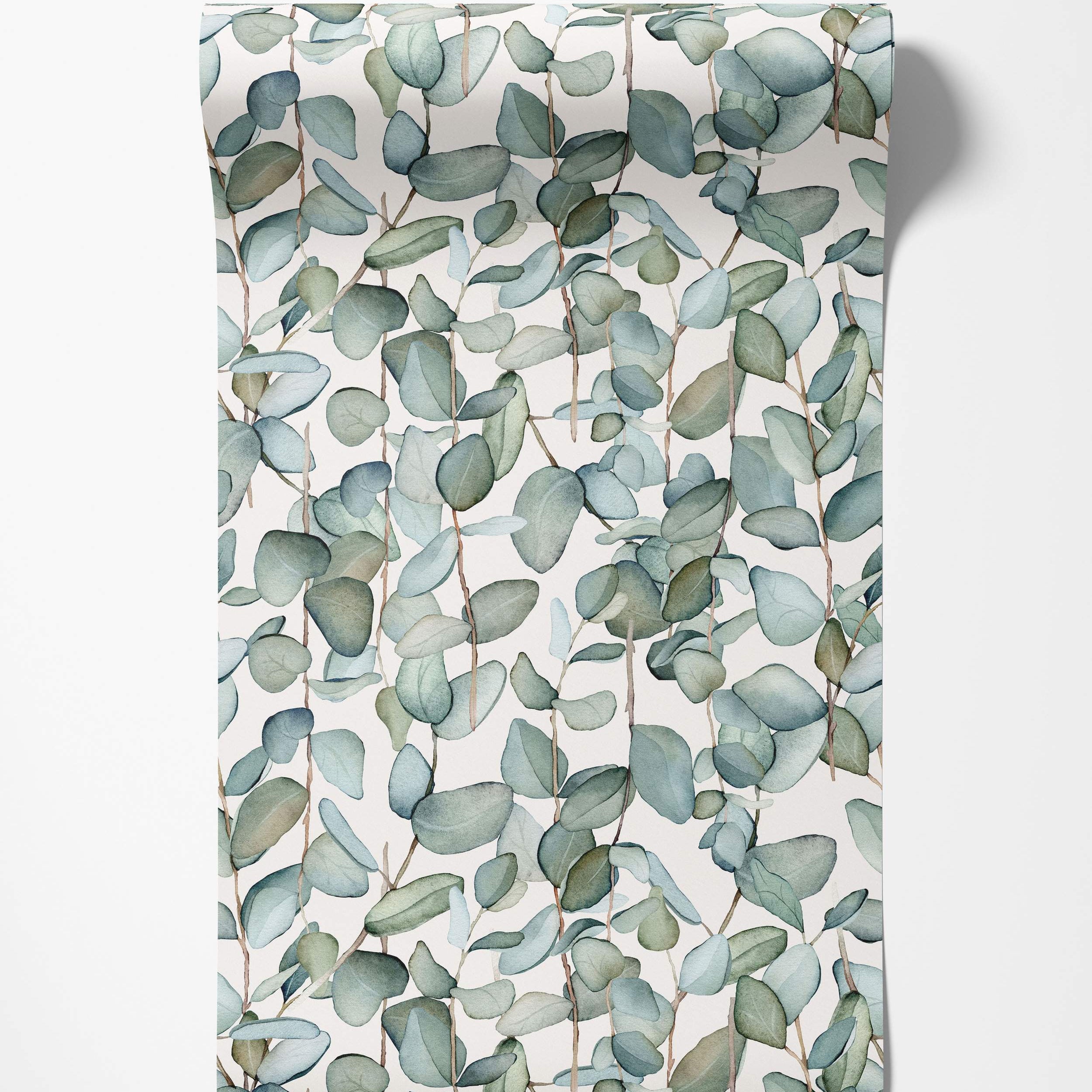 Watercolor eucalyptus wallpaper featuring trailing branches with muted green and blue-green rounded leaves on a light background.