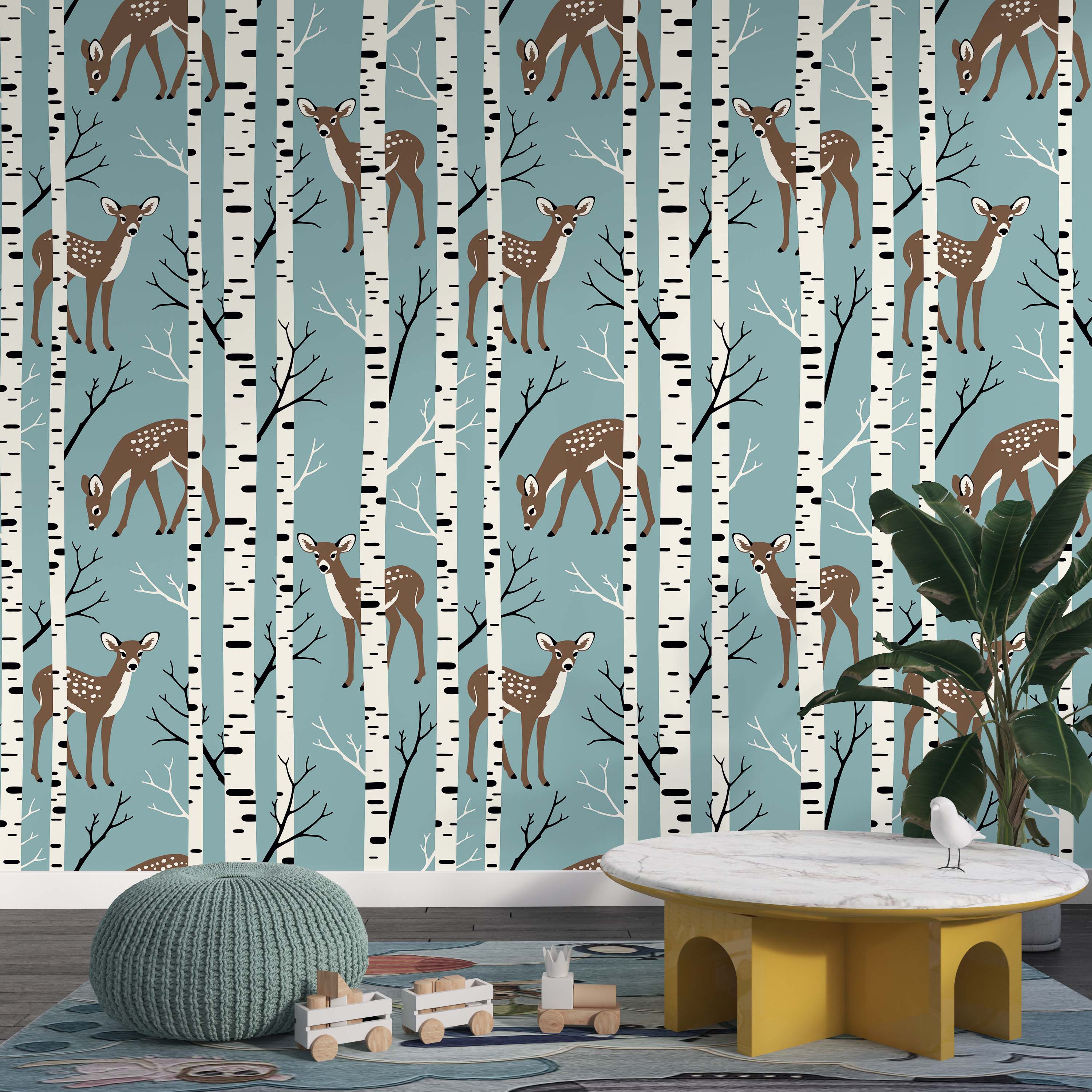 A cute wallpaper pattern featuring brown, spotted fawns and white birch trees against a dusty blue background.