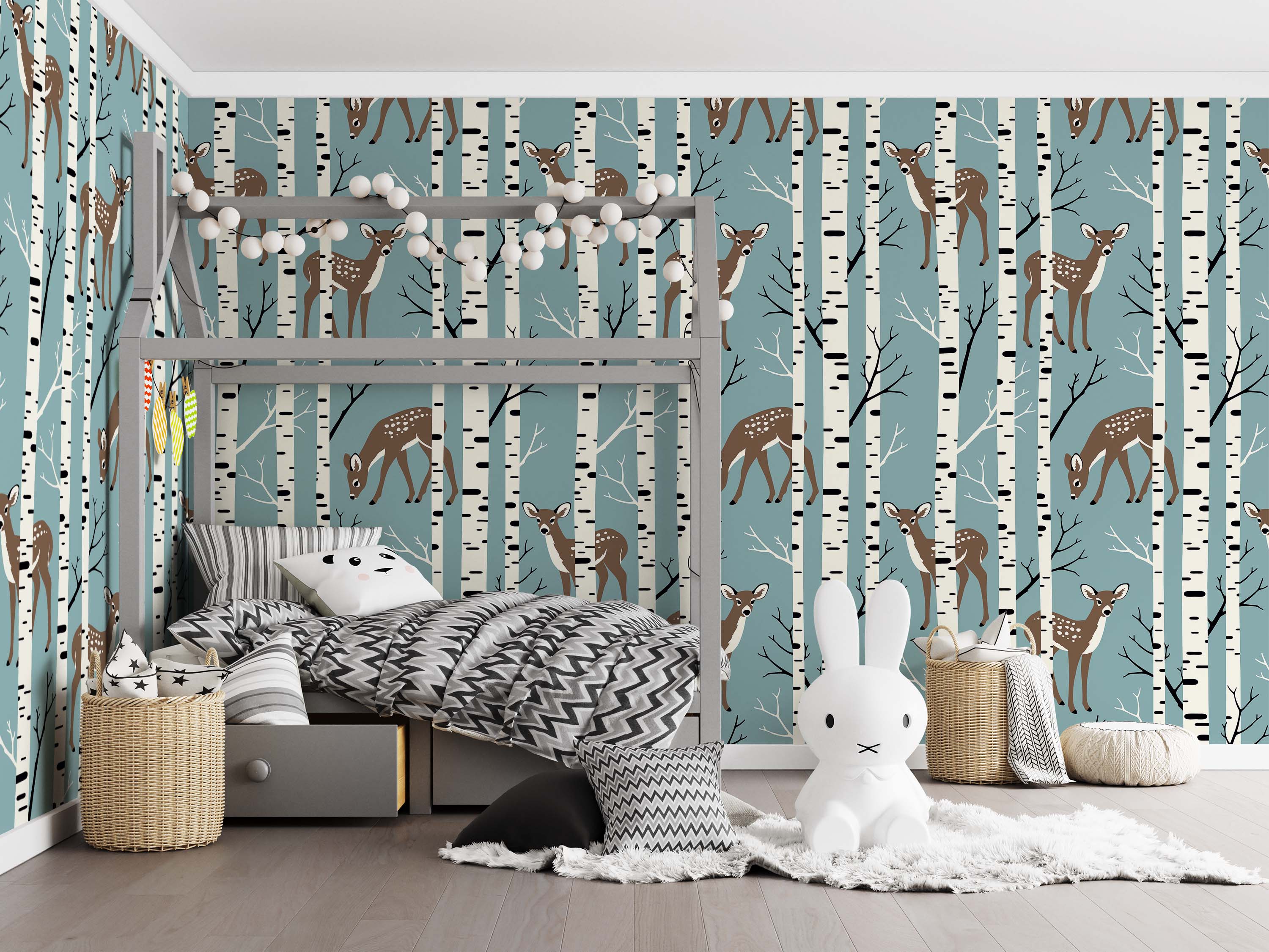 A woodland wallpaper featuring cute brown fawns with white spots among white and black birch trees on a teal blue background.
