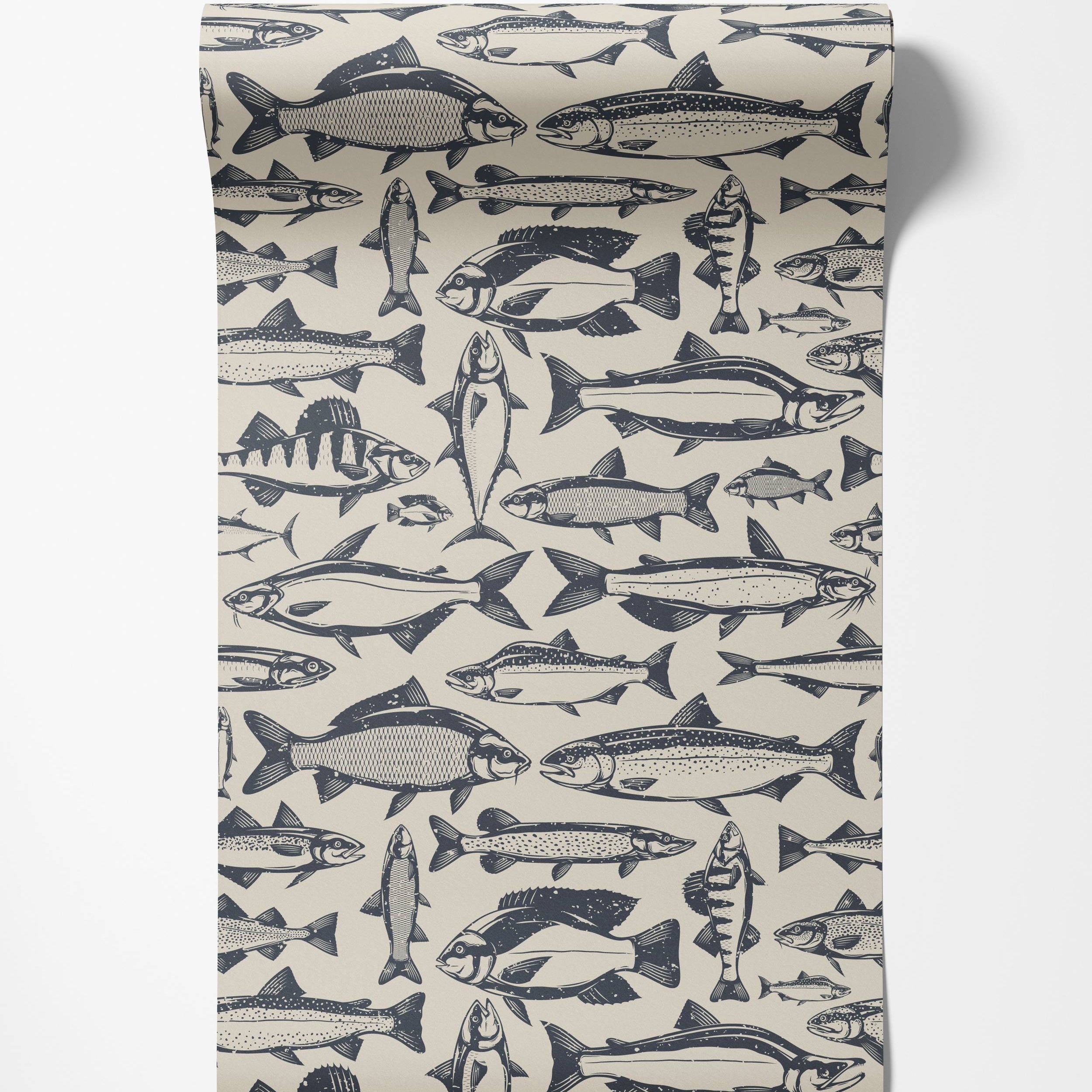 A repeating pattern of various fish in a dark blue, block-print style on a light beige wallpaper.