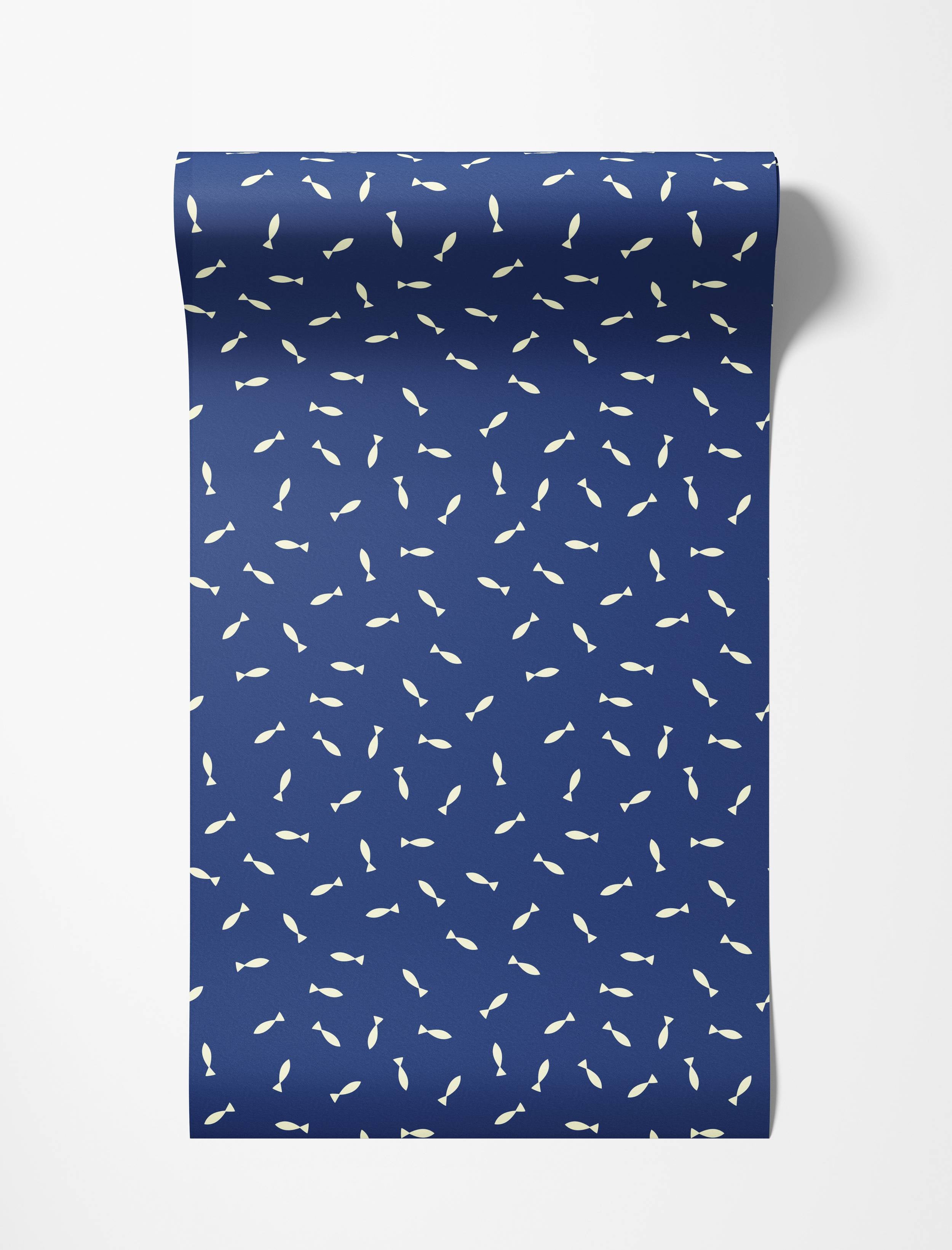 A playful wallpaper featuring a scattered pattern of simple, cream-colored fish on a dark blue background.