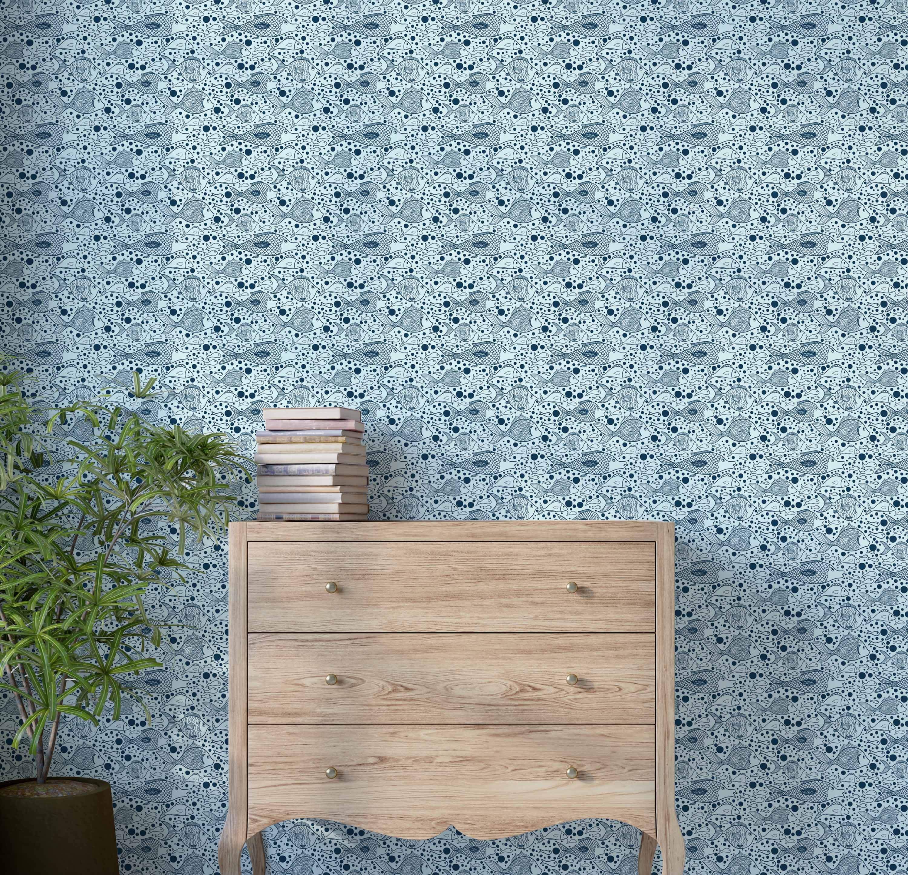 Wallpaper features a pattern of blue illustrated fish and dots swimming across a pale blue background.