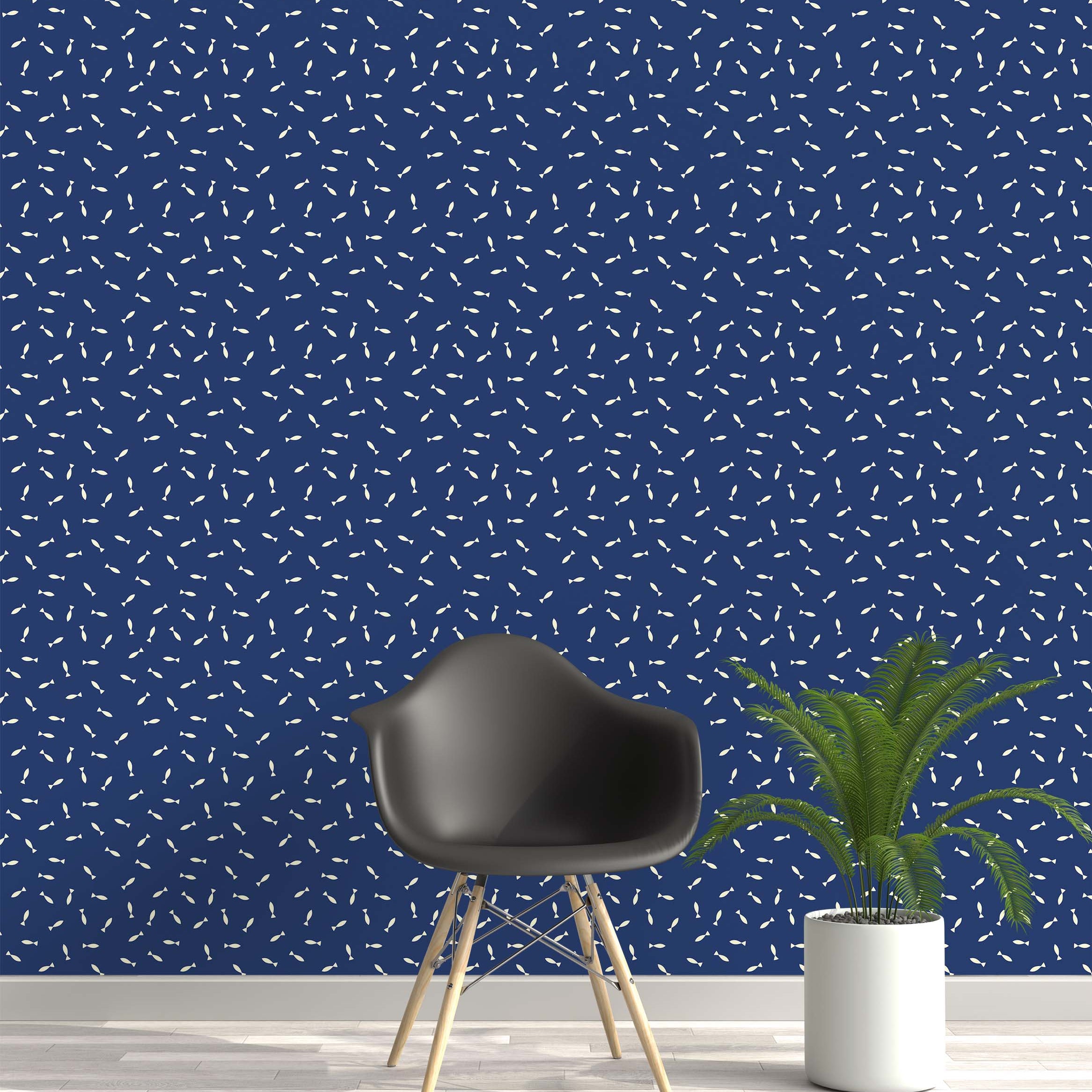 A playful wallpaper featuring a dense pattern of small, cream-colored fish scattered across a deep blue background.
