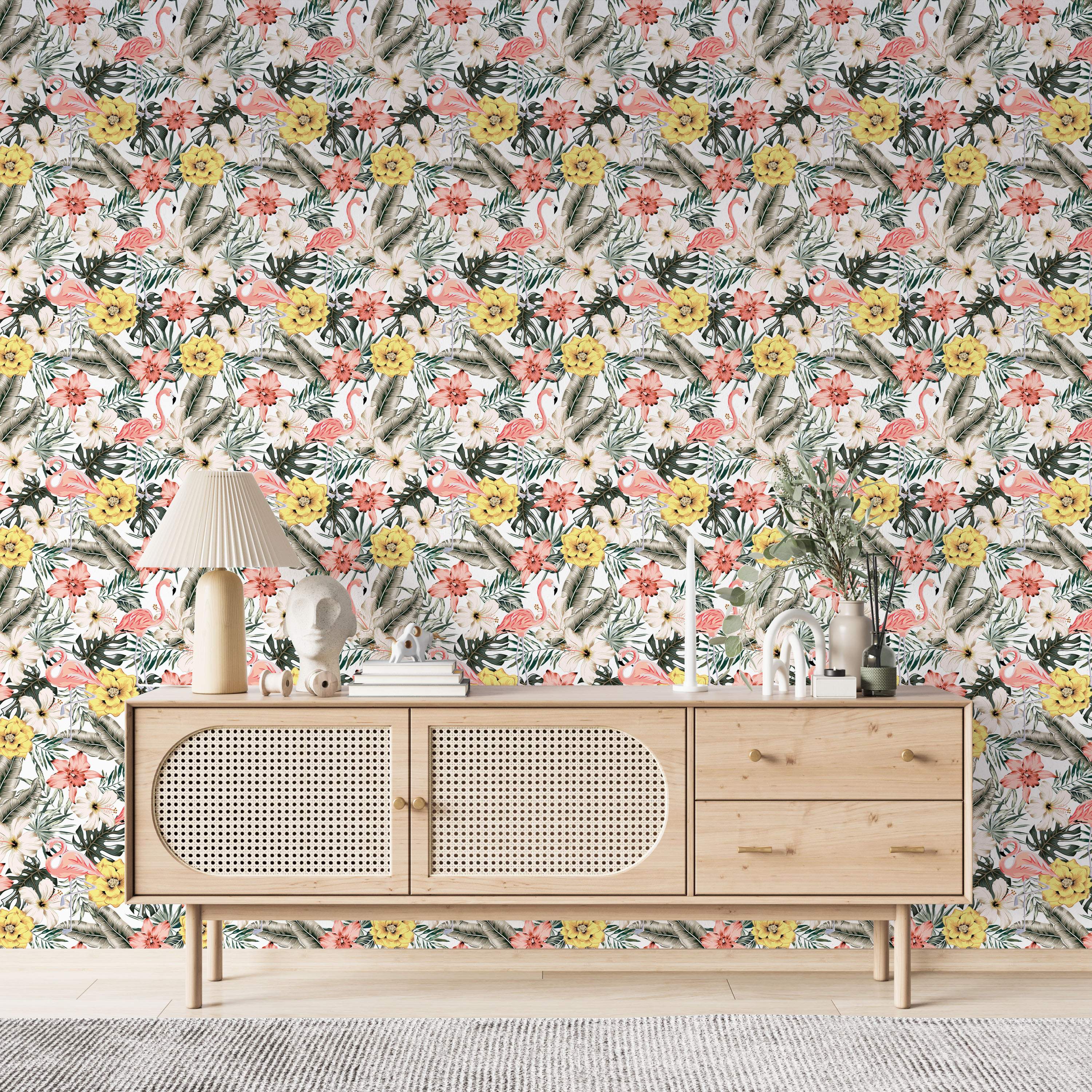 Tropical wallpaper with pink flamingos, yellow and pink hibiscus flowers, and green palm leaves scattered on a white background.