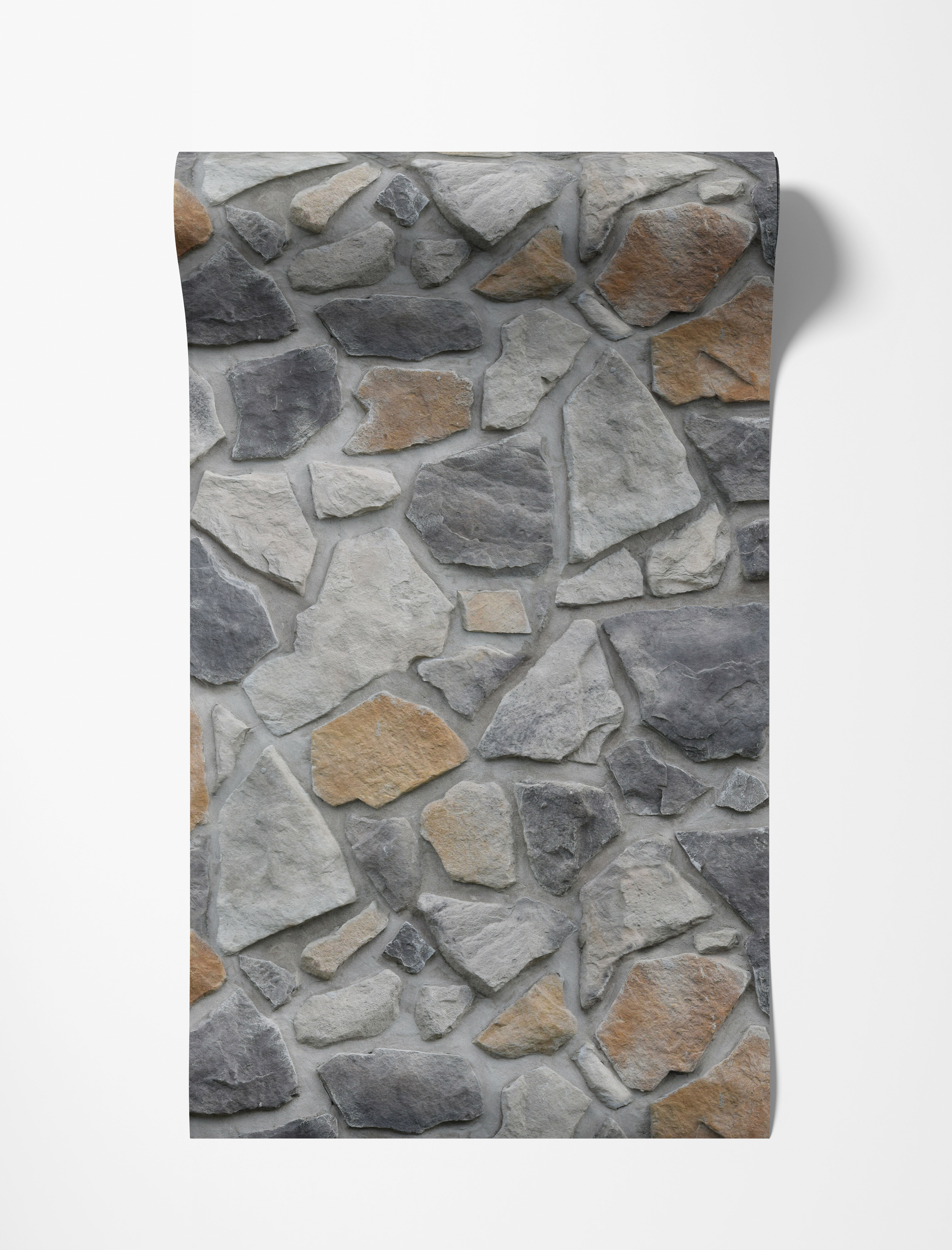 Wallpaper with a realistic flat stone pattern, showcasing irregular gray and tan stones set in light gray grout for a textured look.