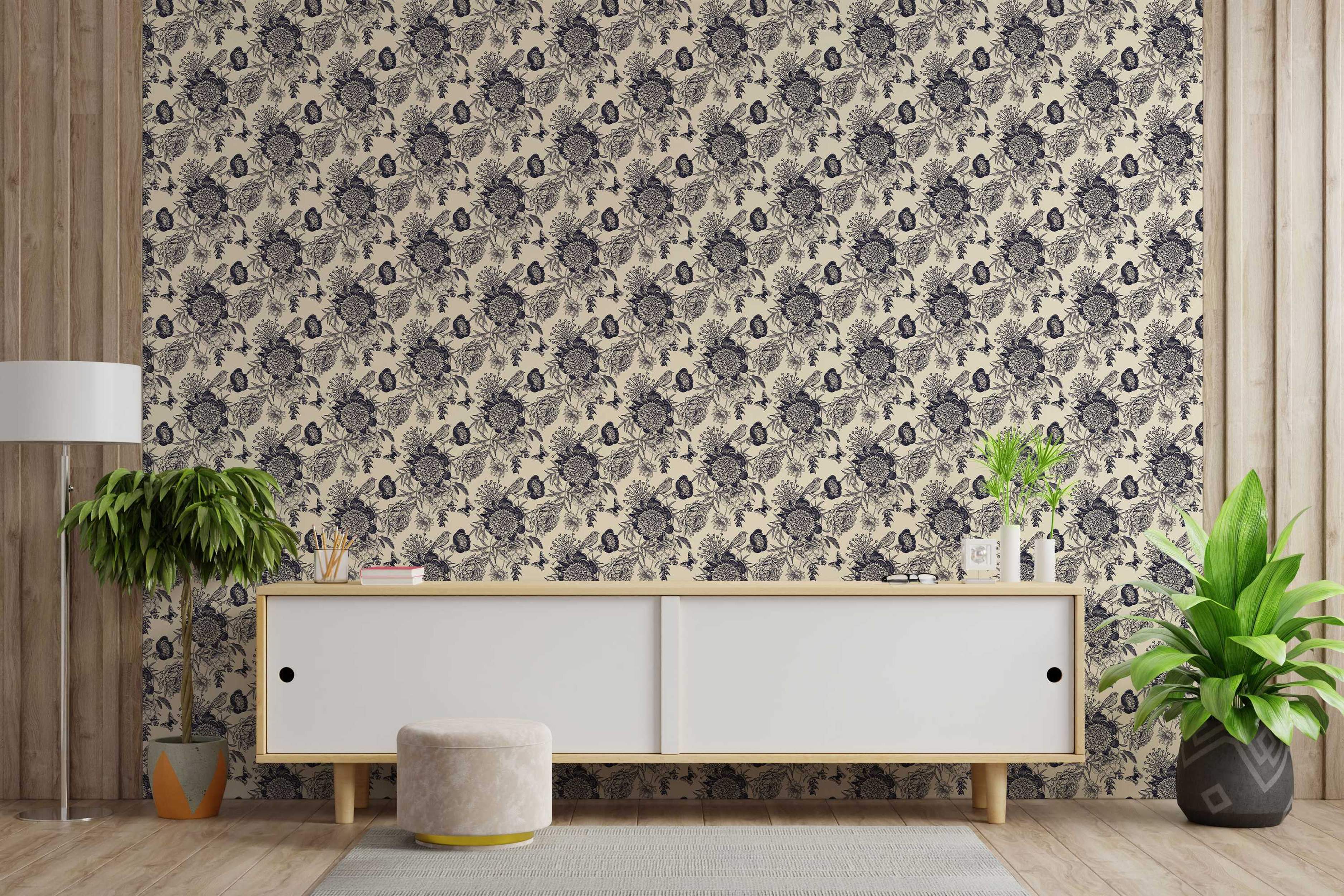 Navy blue floral toile wallpaper featuring intricate birds and butterflies on a cream background.