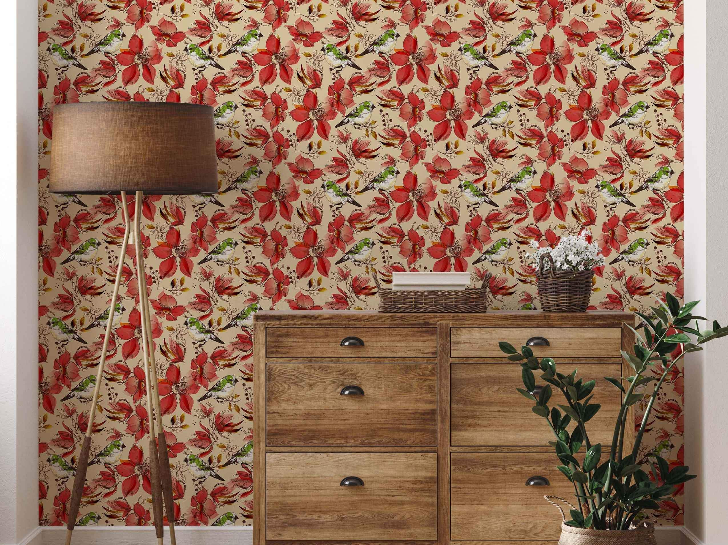 Wallpaper featuring a repeating pattern of sketched red flowers and green birds on a light beige background.