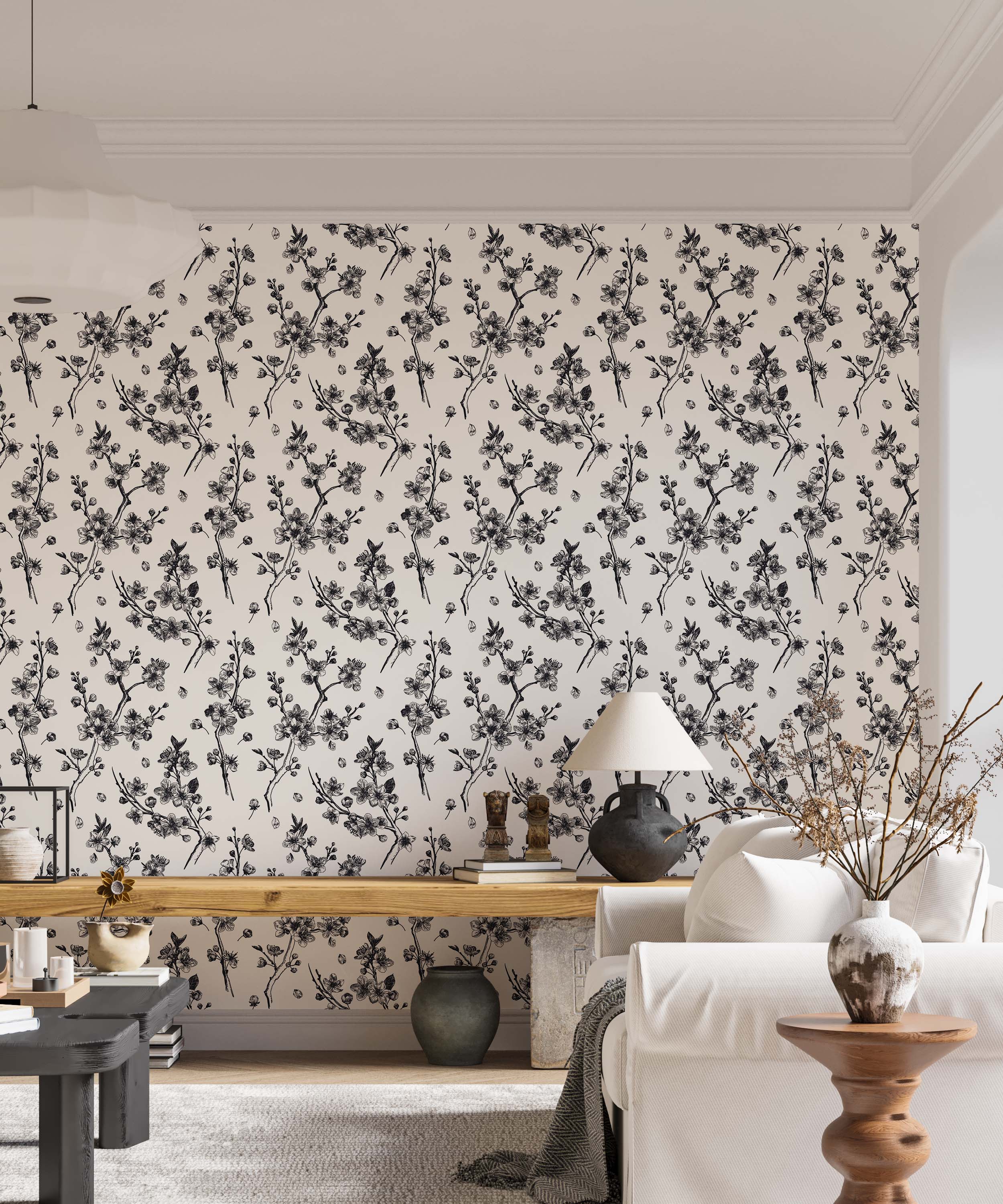 Hand-drawn style wallpaper with repeating black cherry blossom branches and petals on an off-white field.