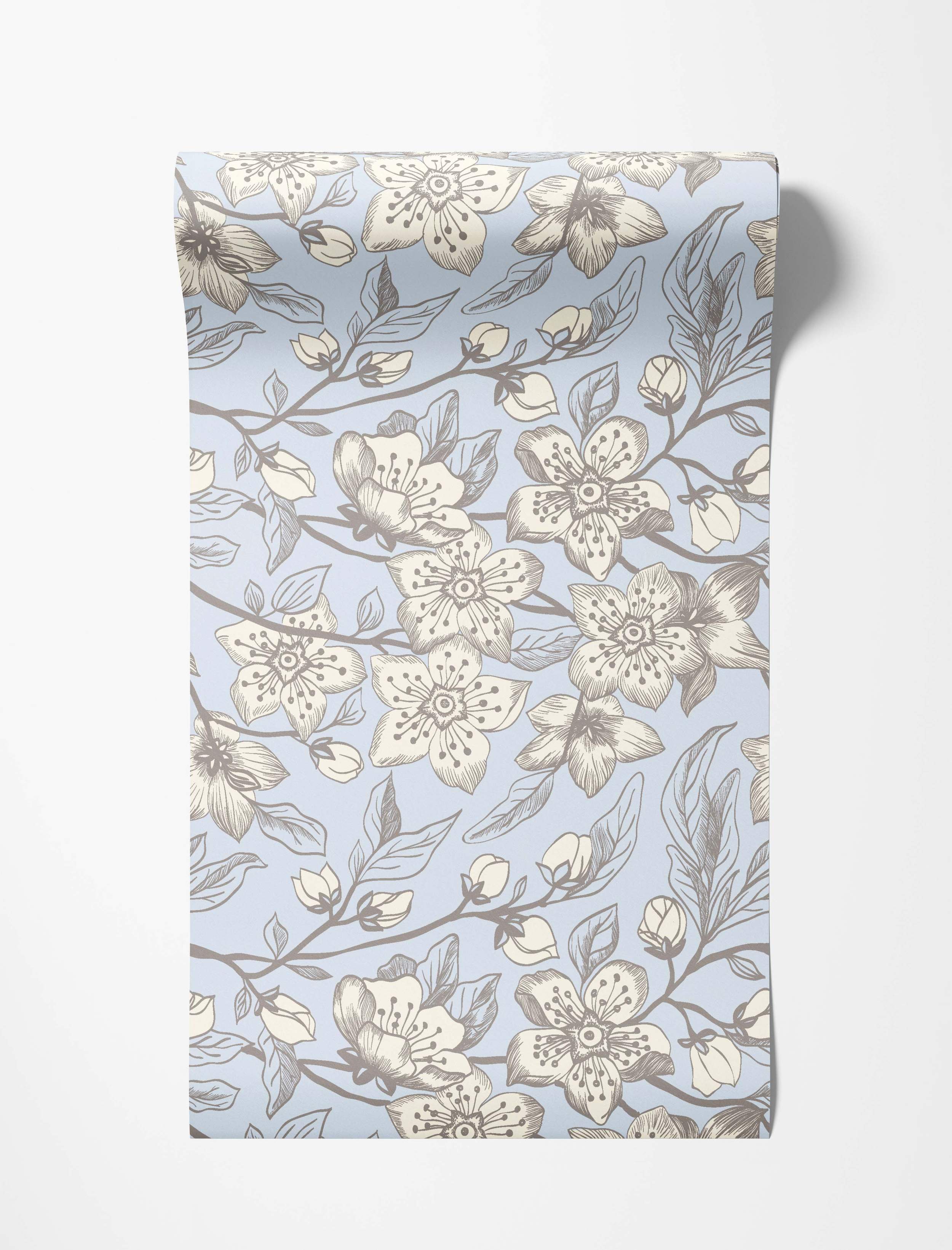 Sketchy floral wallpaper with cream and grey flowers, buds, and branches on a light blue background.