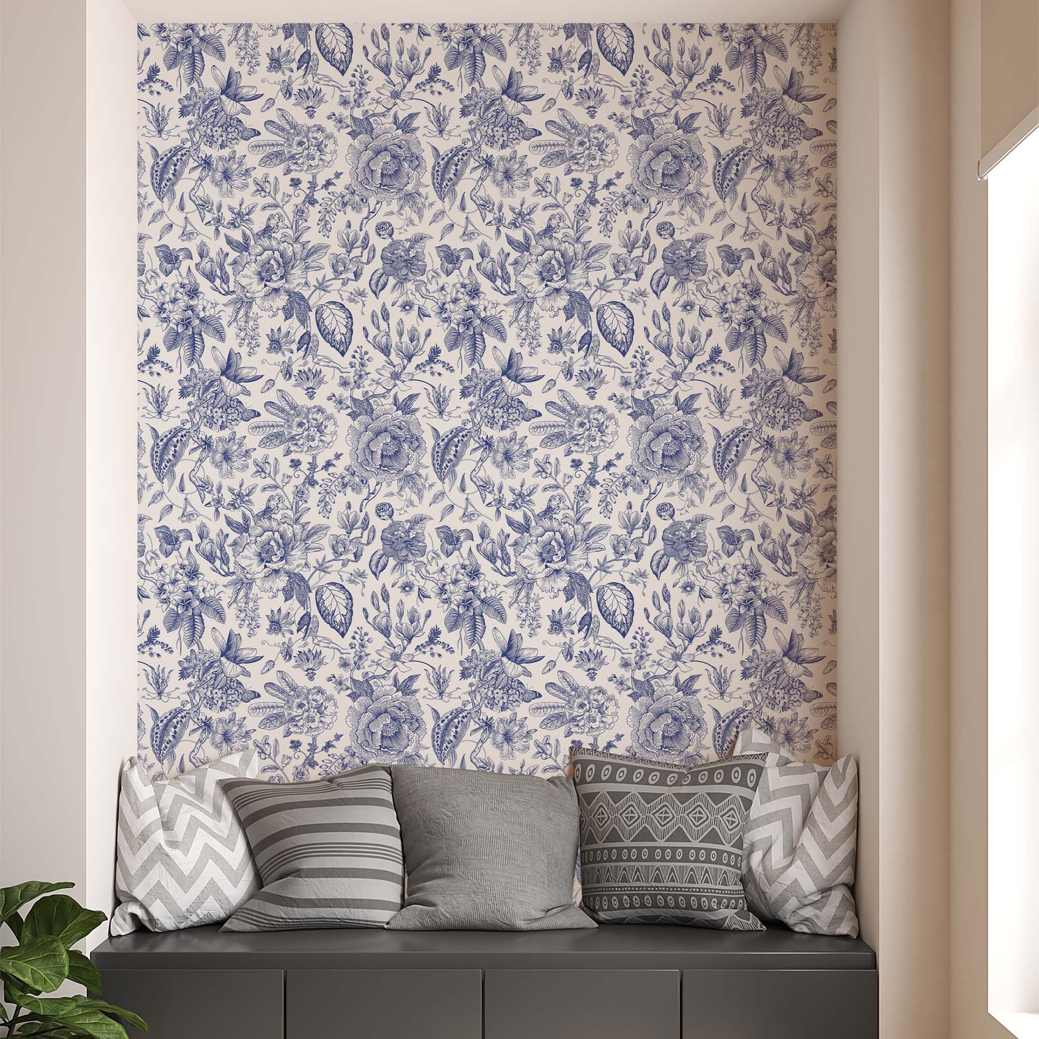 Intricate botanical wallpaper with detailed, hand-drawn floral and leaf motifs in a classic blue on a cream background.