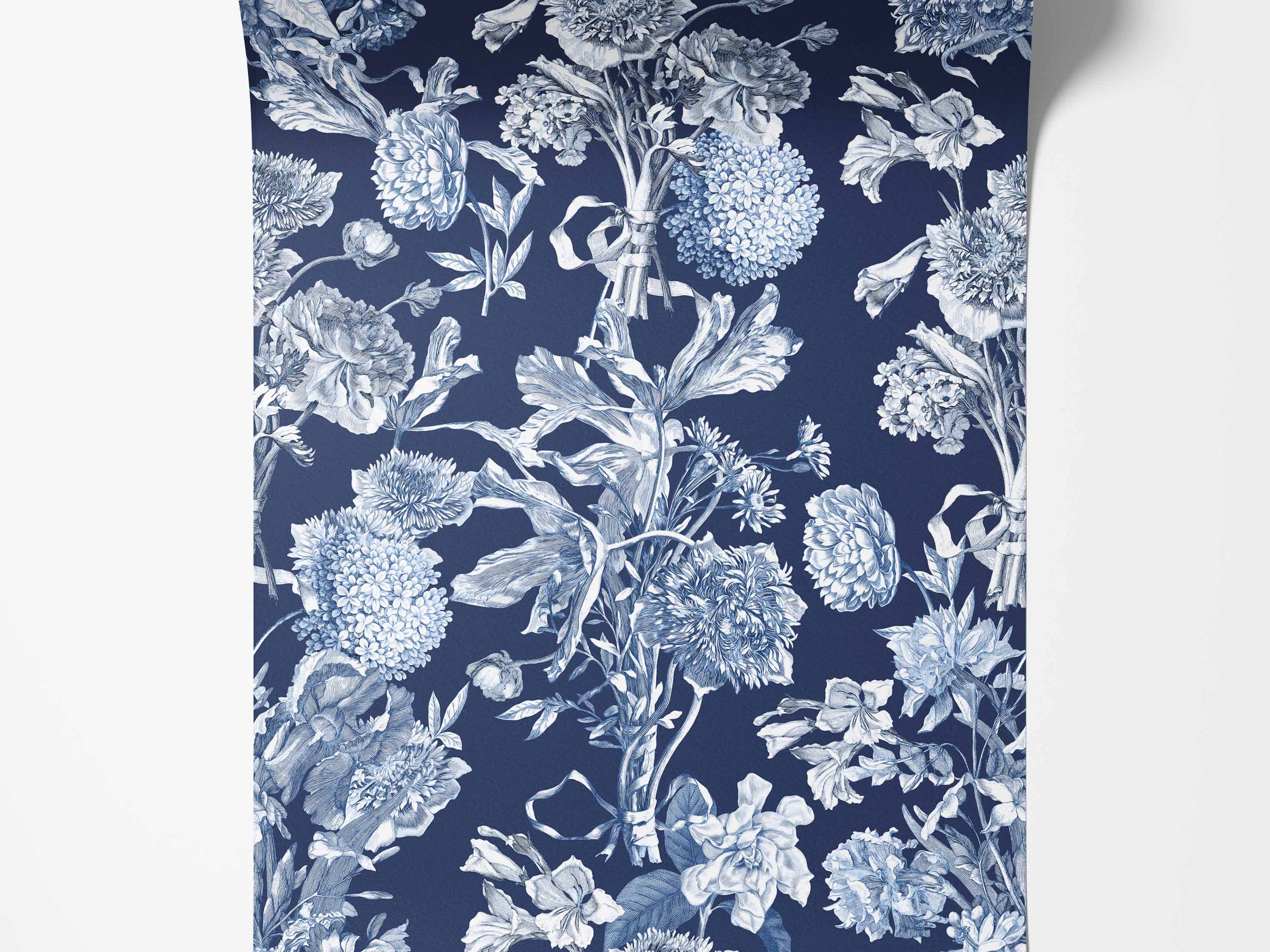 Detailed white and blue floral illustration wallpaper with bouquets and ribbons on a dark navy blue background.
