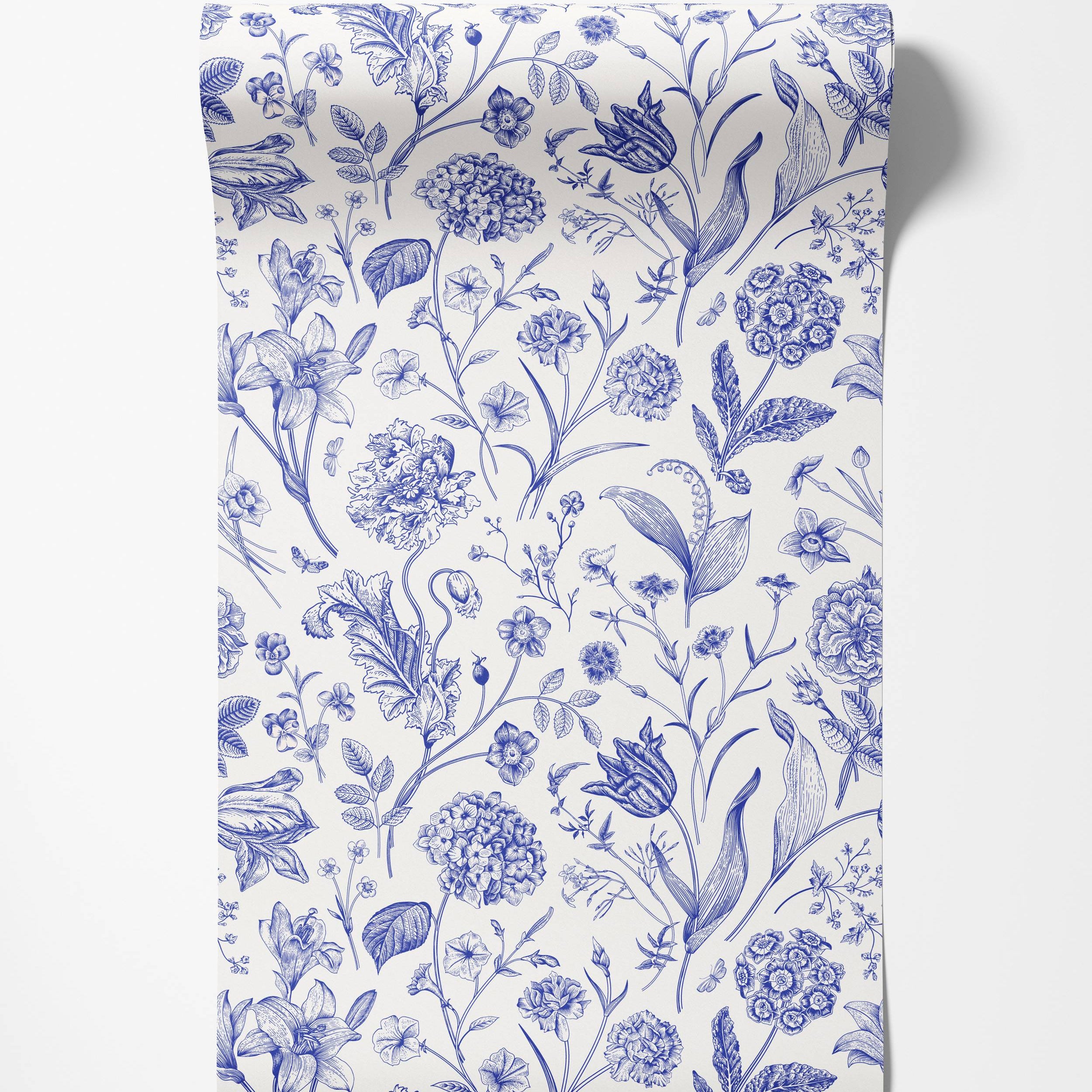 Vintage botanical wallpaper with intricate blue floral illustrations on a white background, featuring a variety of flowers and leaves.