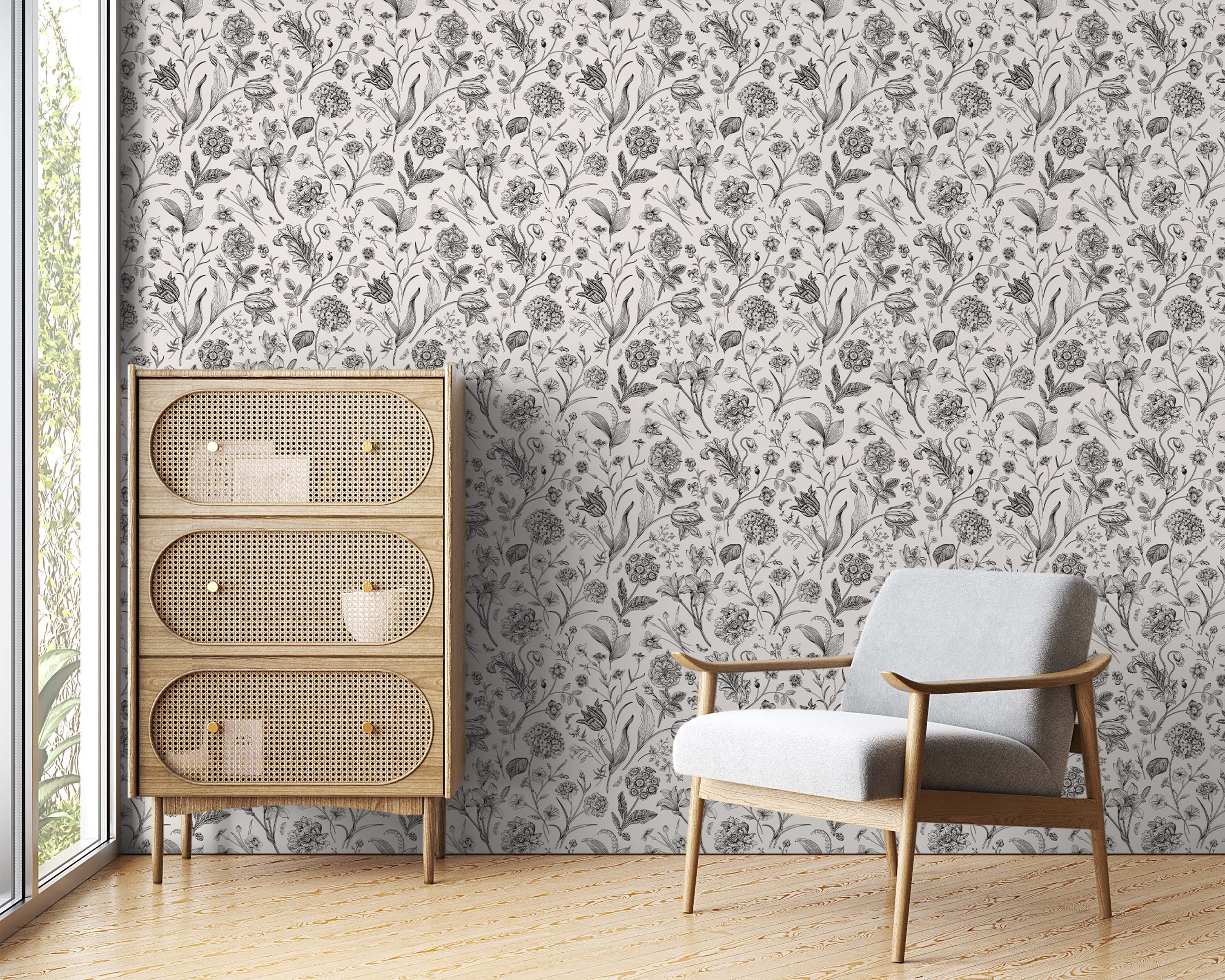 Wallpaper showcasing a repeating pattern of detailed black line-art floral and botanical illustrations on a light cream background.
