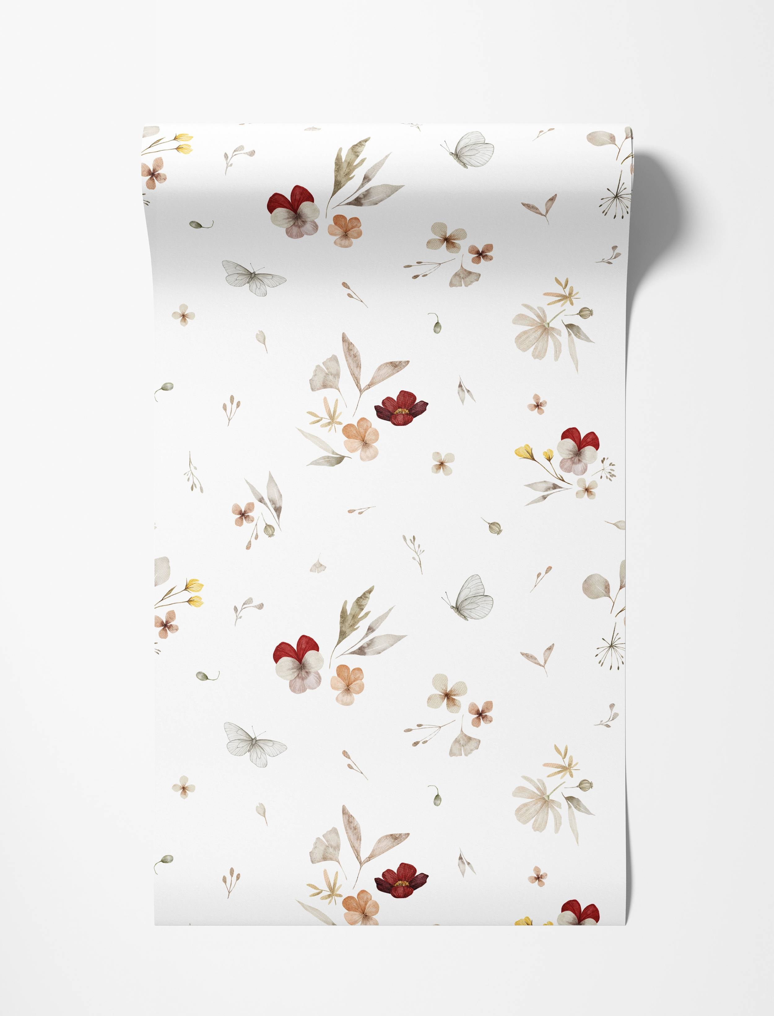 Delicate watercolor wallpaper with a scattered floral and butterfly pattern in earthy red, orange, and brown hues on a white field.