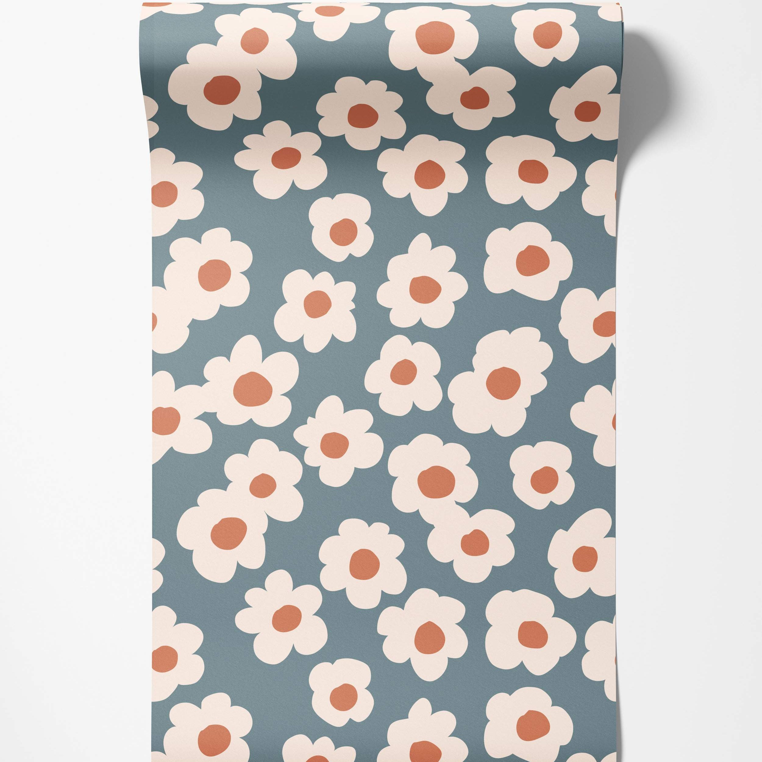 Wallpaper features a pattern of stylized cream daisies with rust centers on a dusty blue field.