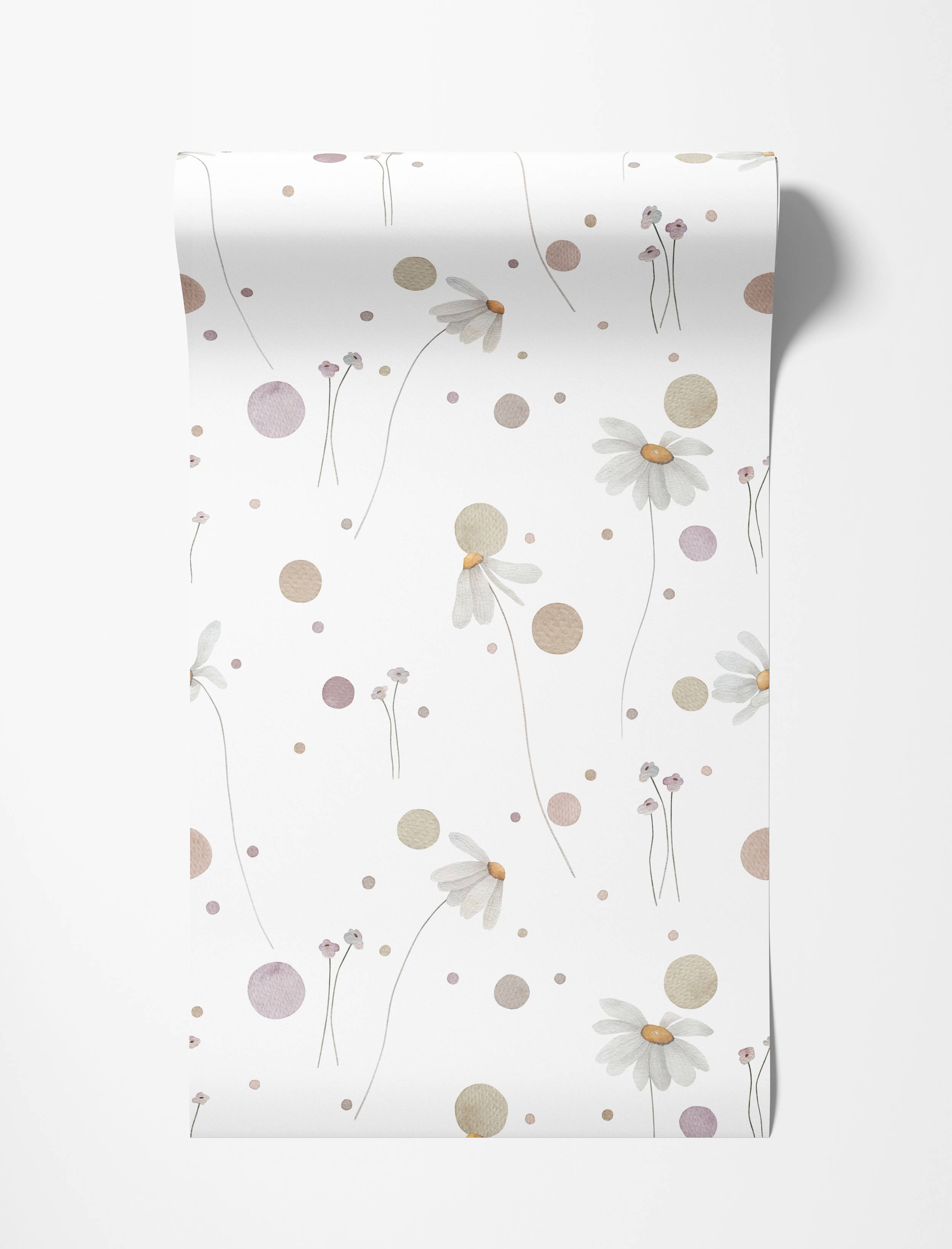 Wallpaper with a delicate watercolor pattern of daisies, small flowers, and polka dots in muted pink, beige, and white.