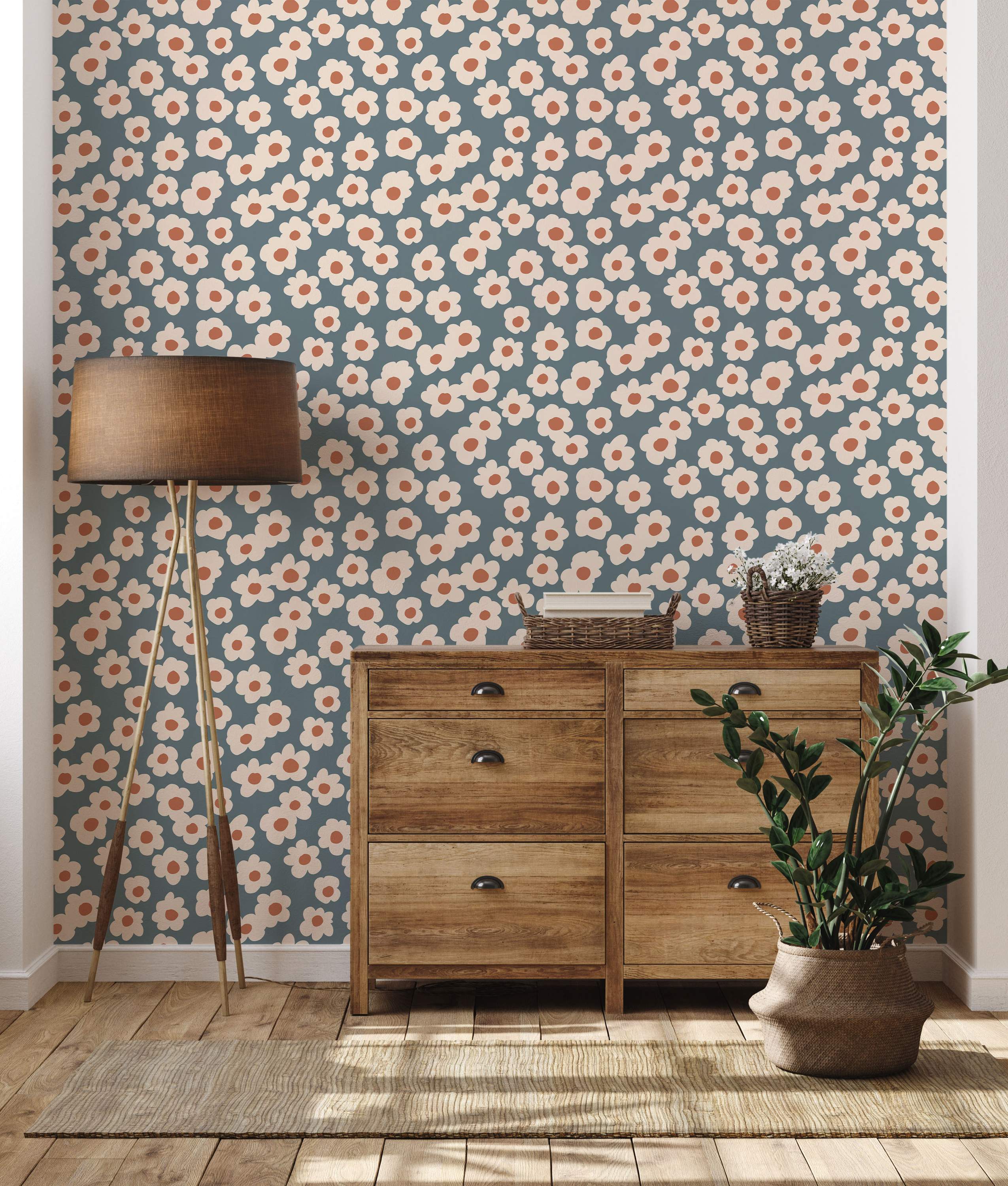 Wallpaper featuring a repeating pattern of stylized cream daisies with orange centers on a muted teal background.