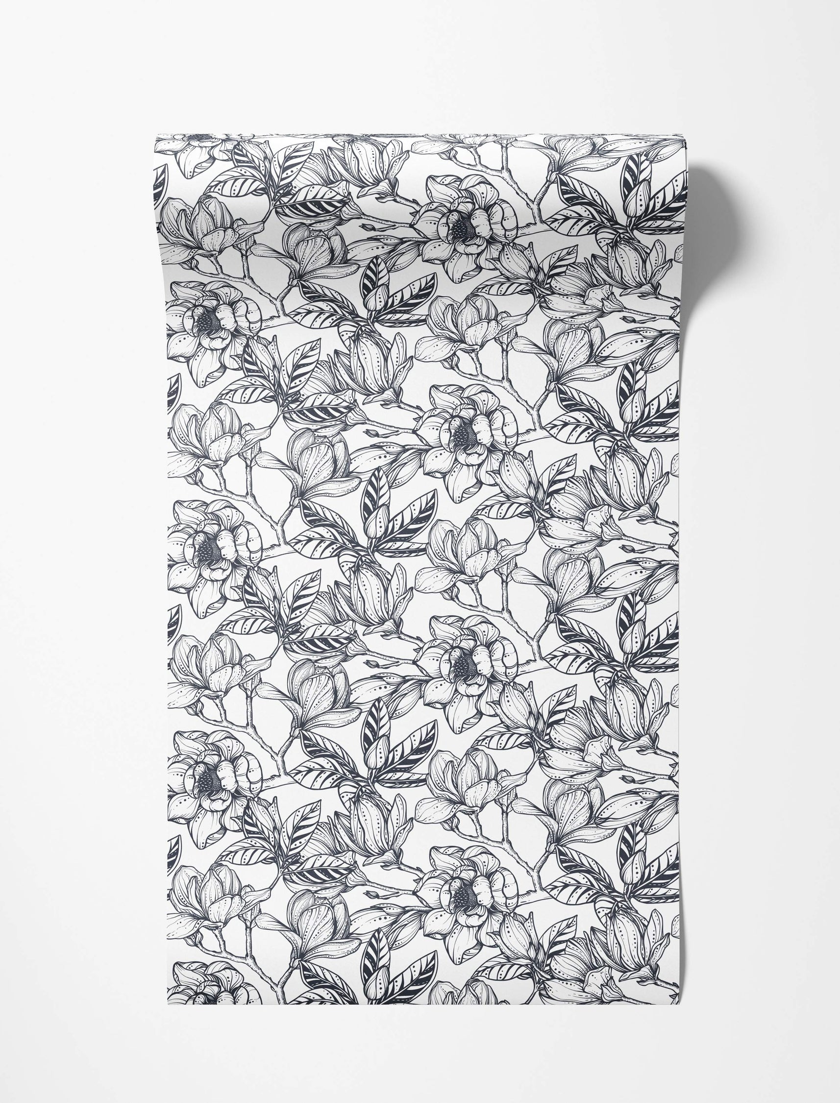Monochrome wallpaper featuring a detailed black line art pattern of magnolia flowers and leaves on a white background.