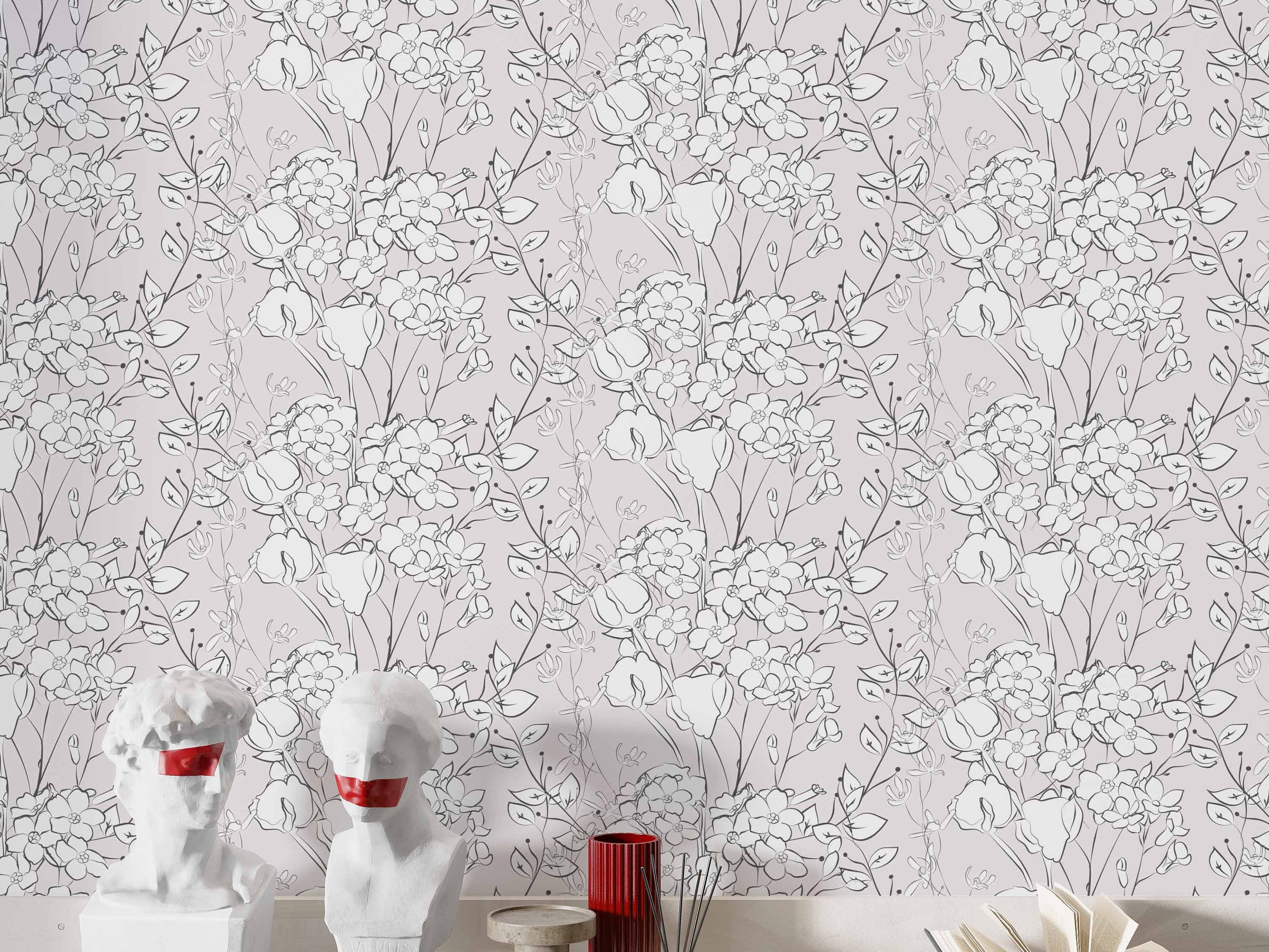 Pink wallpaper with a repeating pattern of black and white outlined flowers and leaves in a line art style.