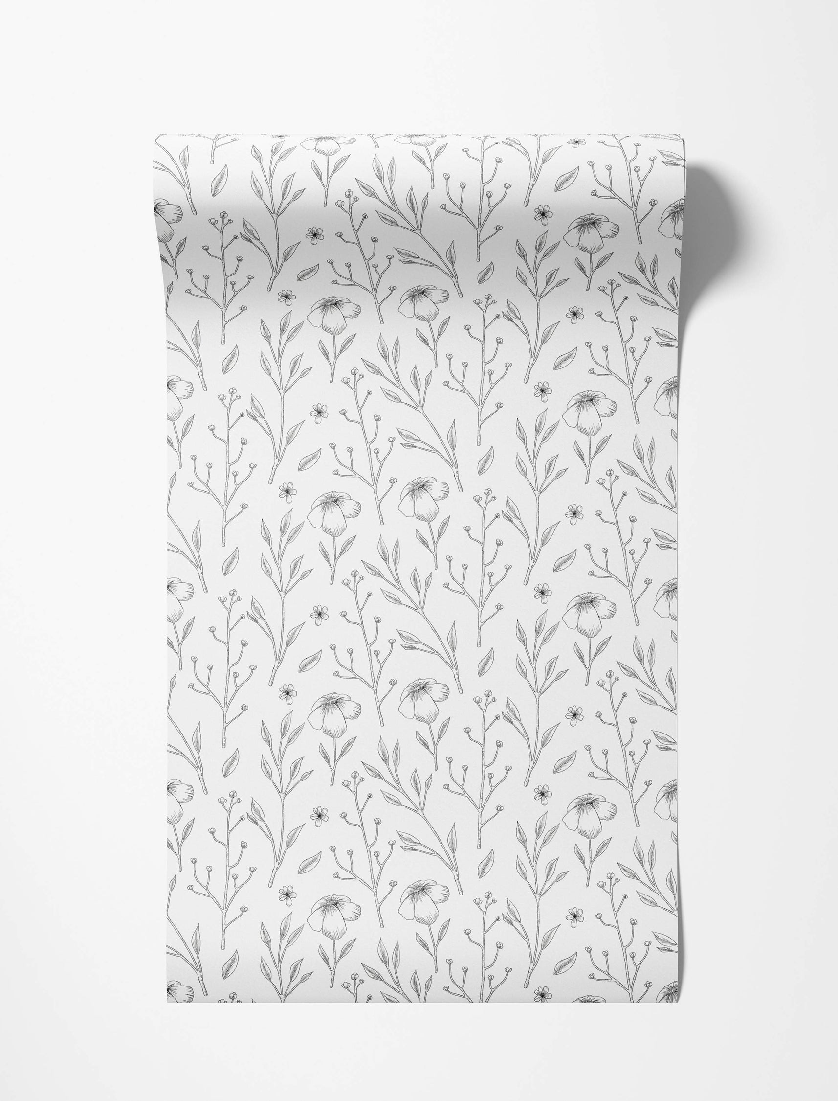 Black line art floral wallpaper featuring delicate sketched flowers, leaves, and stems scattered on a white background.