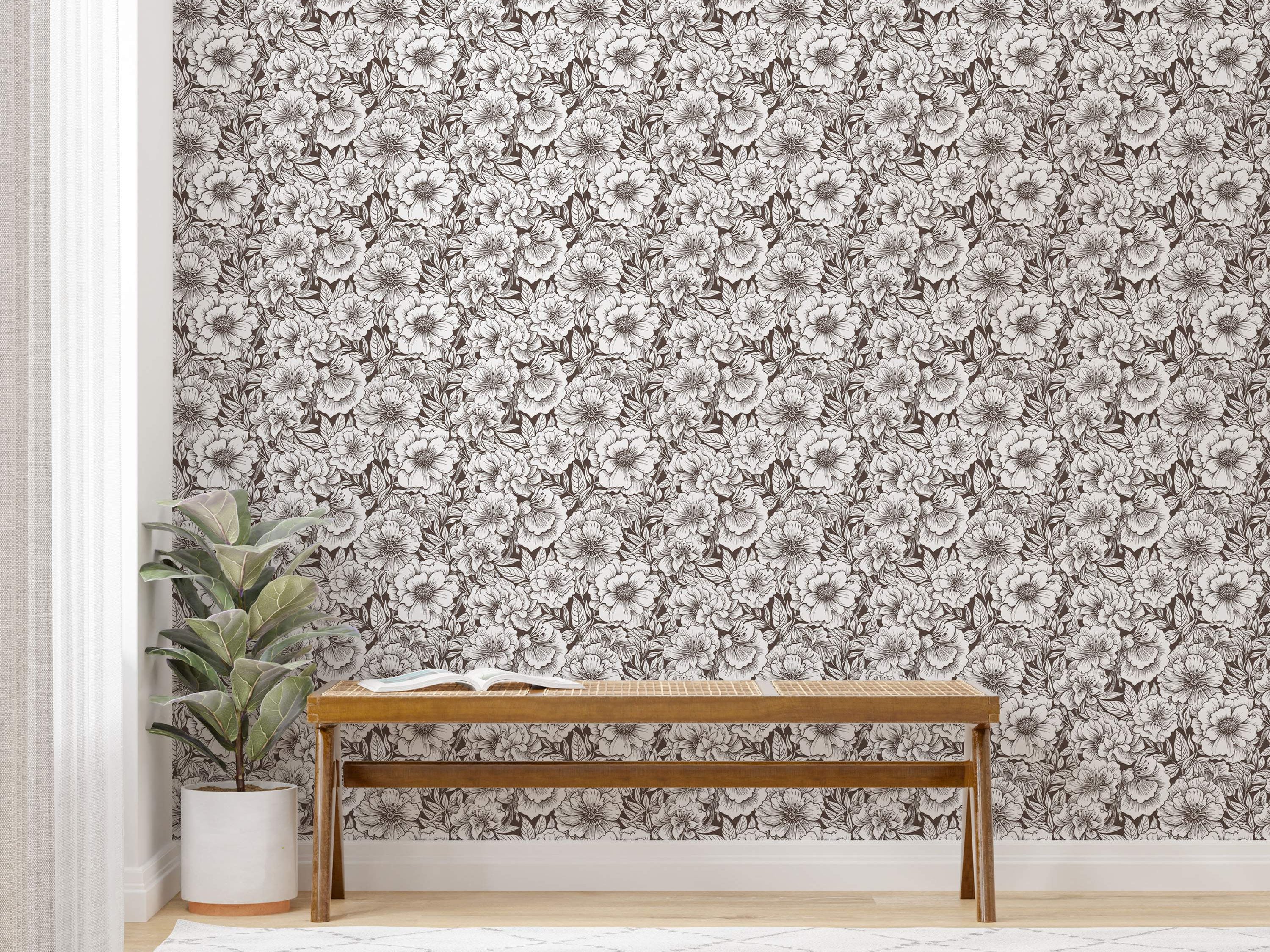 Dense floral wallpaper featuring intricate brown line art of large white flowers and leaves over a dark brown background.
